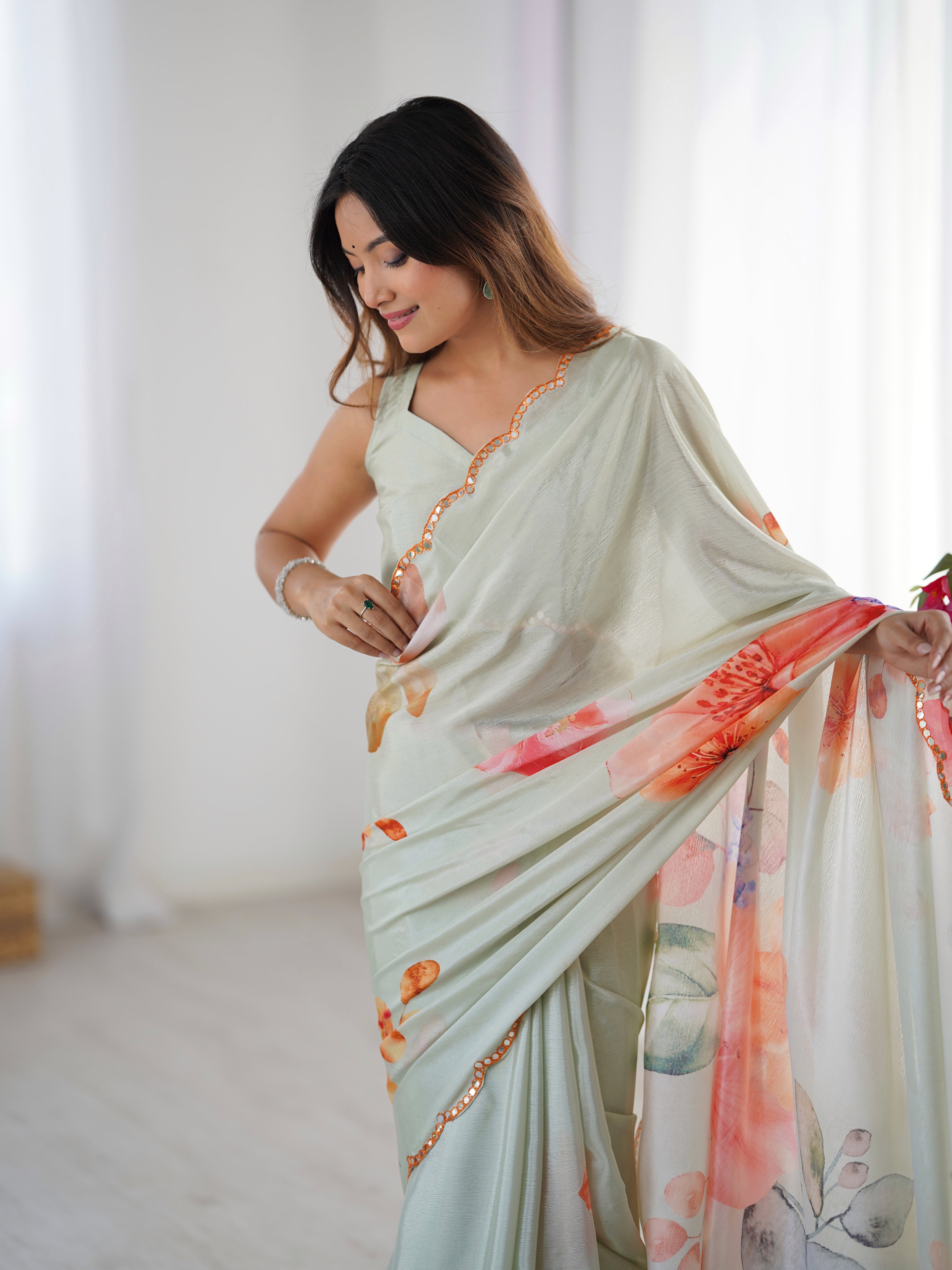 Elegant heavy Chinnon saree with vibrant floral print and Kutchi mirror lace border