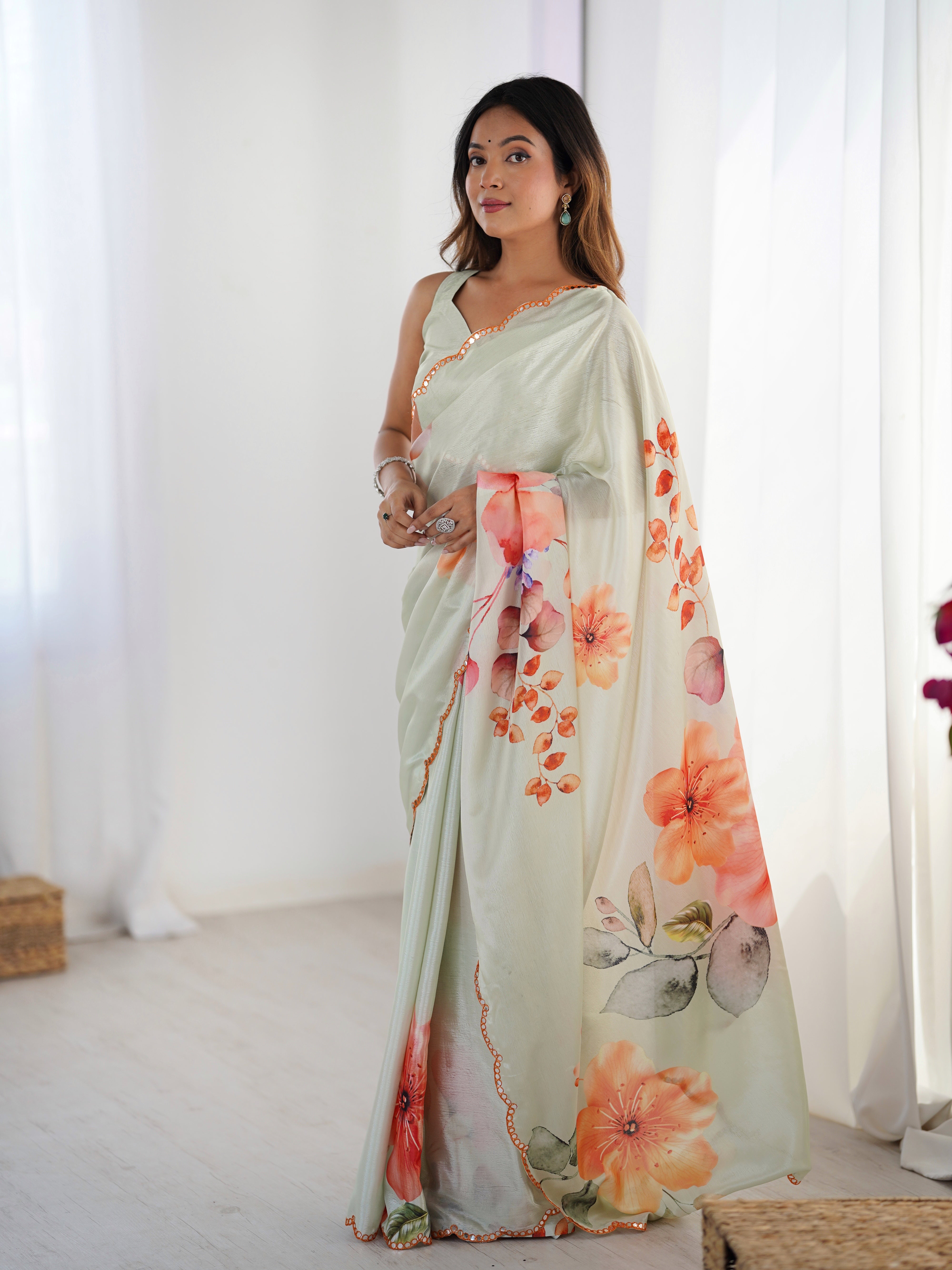 Elegant heavy Chinnon saree with vibrant floral print and Kutchi mirror lace border