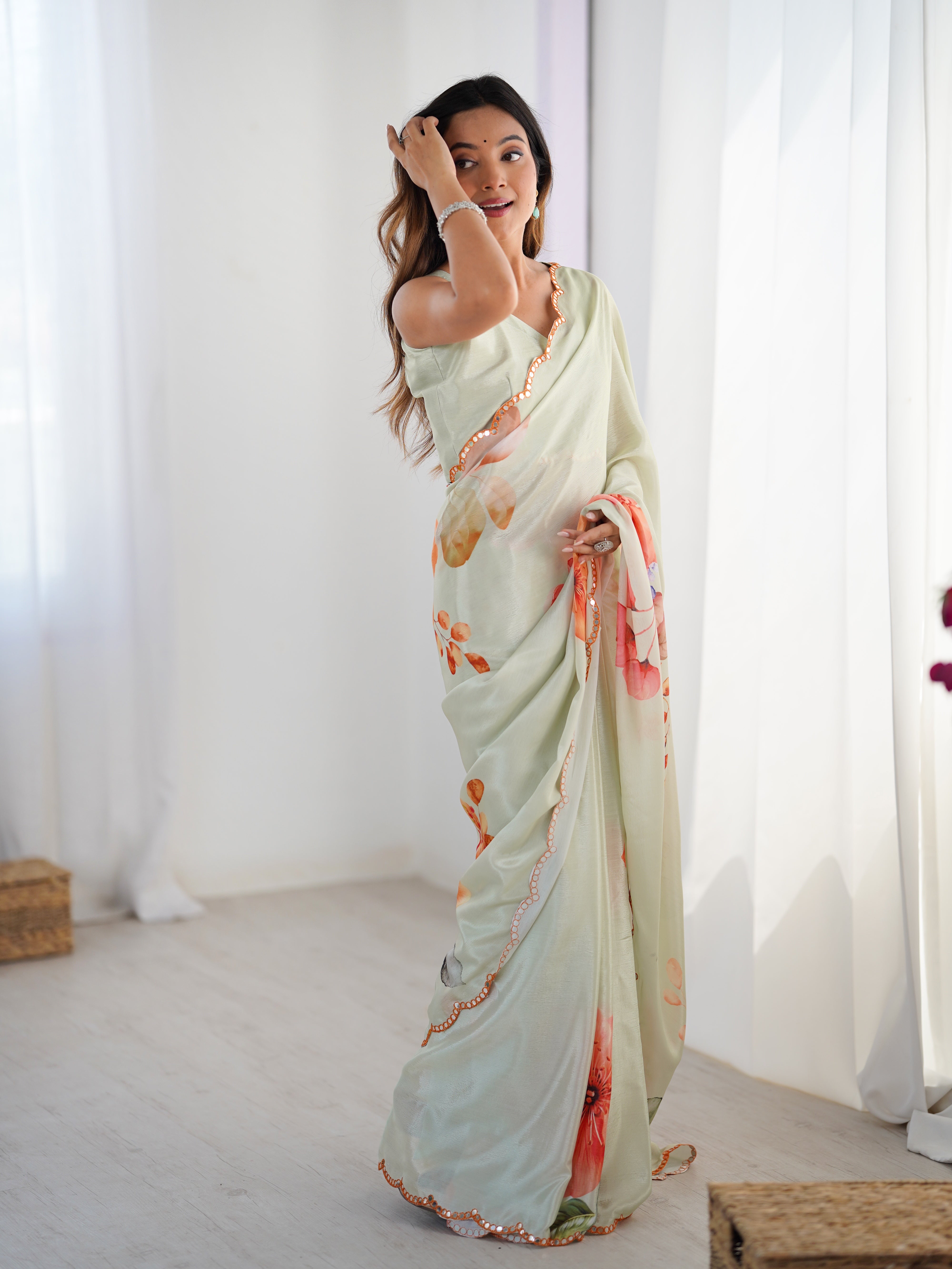 Elegant heavy Chinnon saree with vibrant floral print and Kutchi mirror lace border