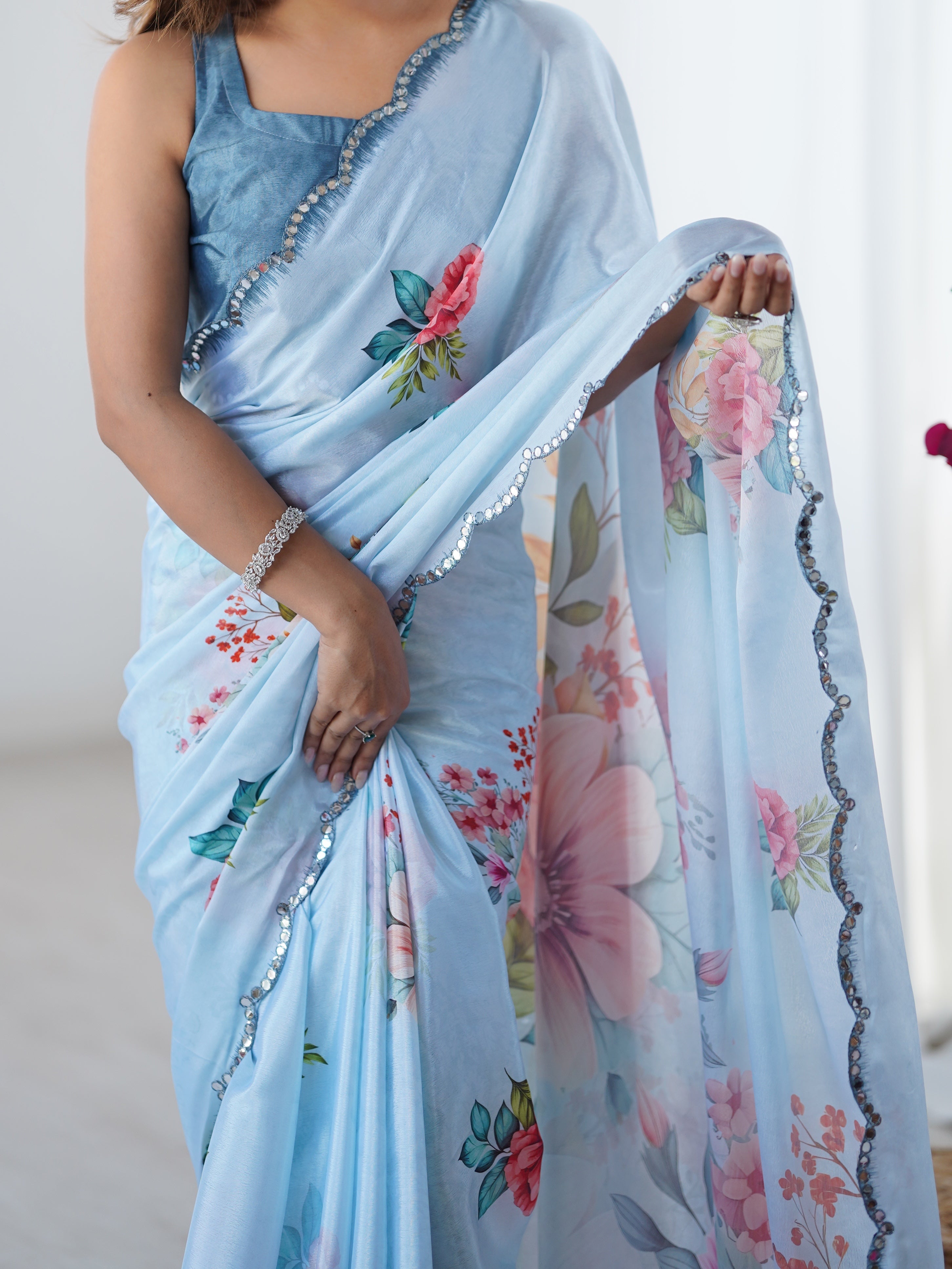 Elegant floral print Chinnon saree with Kutchi mirror lace border