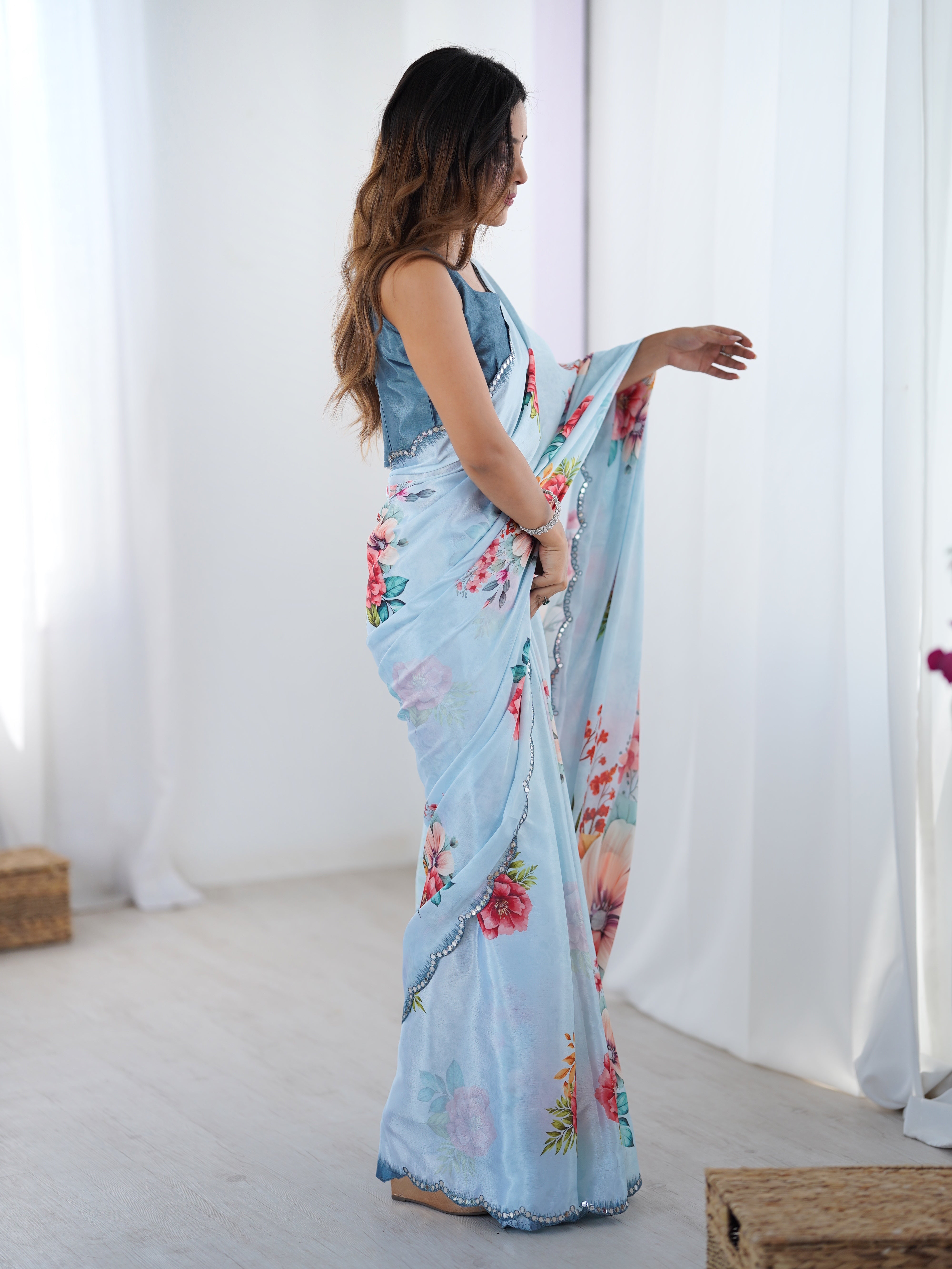 Elegant Chinnon floral print saree with Kutchi mirror lace border.