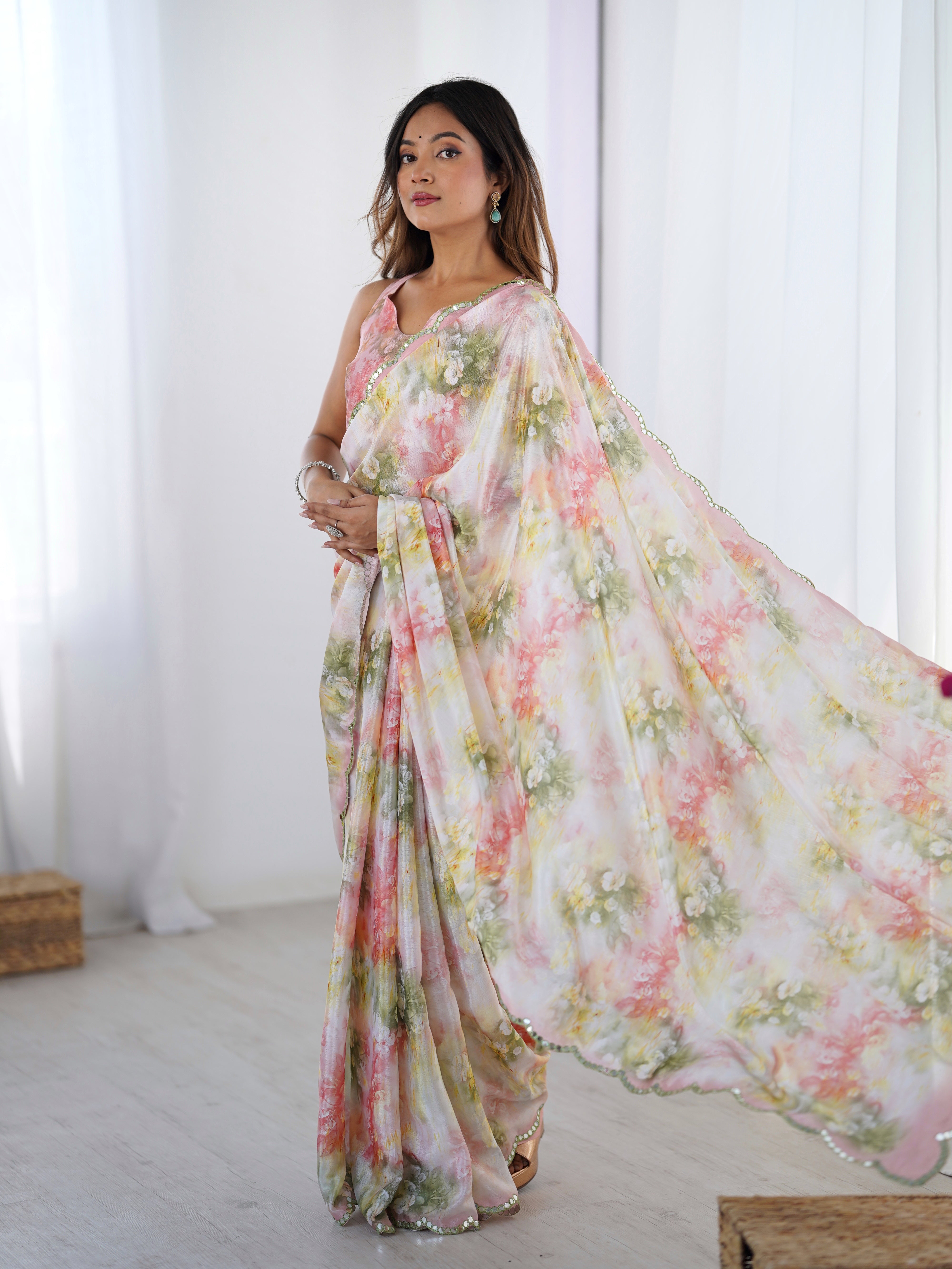 Heavy Chinnon floral print saree with intricate Kutchi mirror lace border
