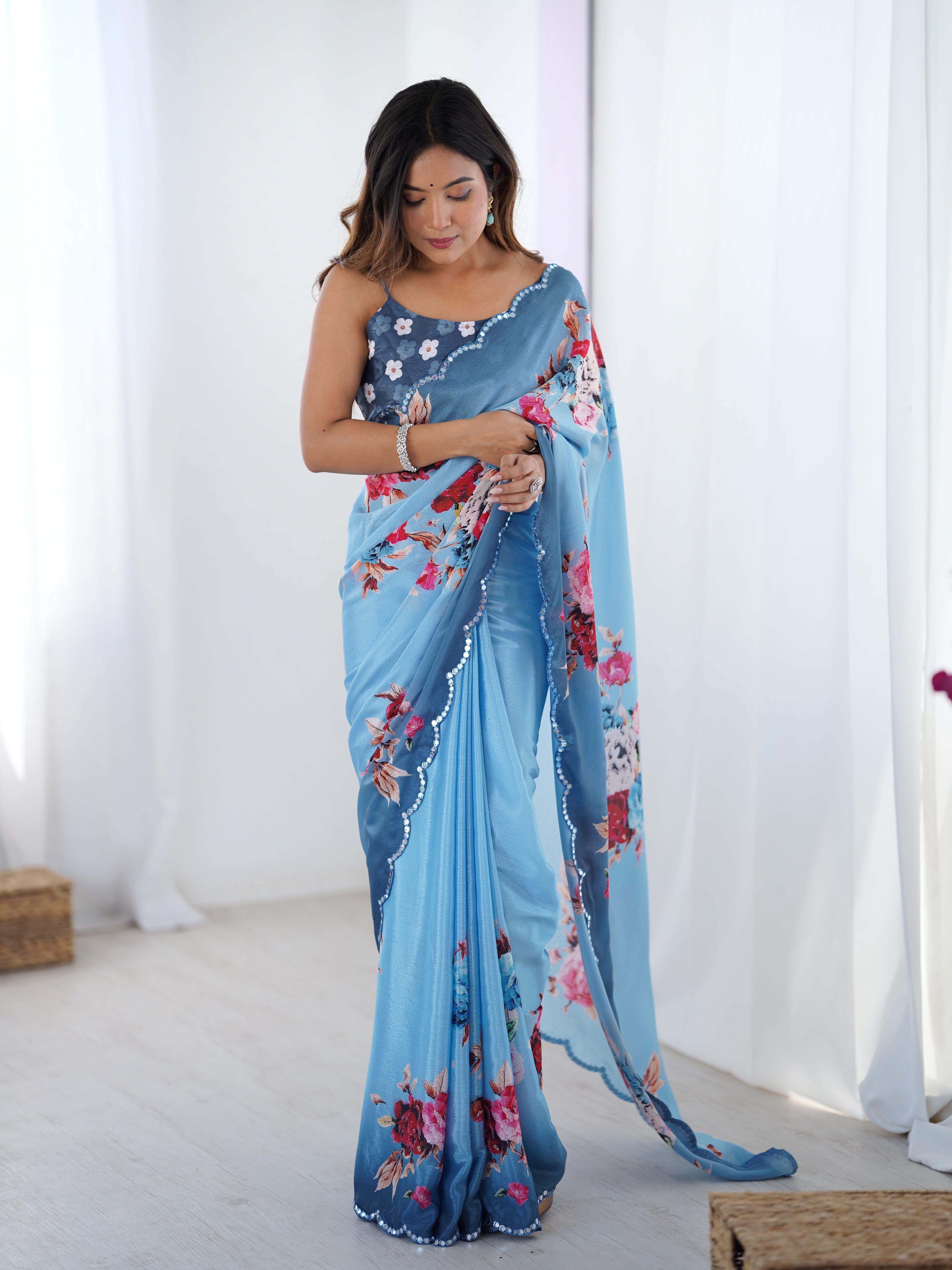 Elegant Sky Blue Chinnon Saree with Floral Print and Kutchi Mirror Work Lace Border