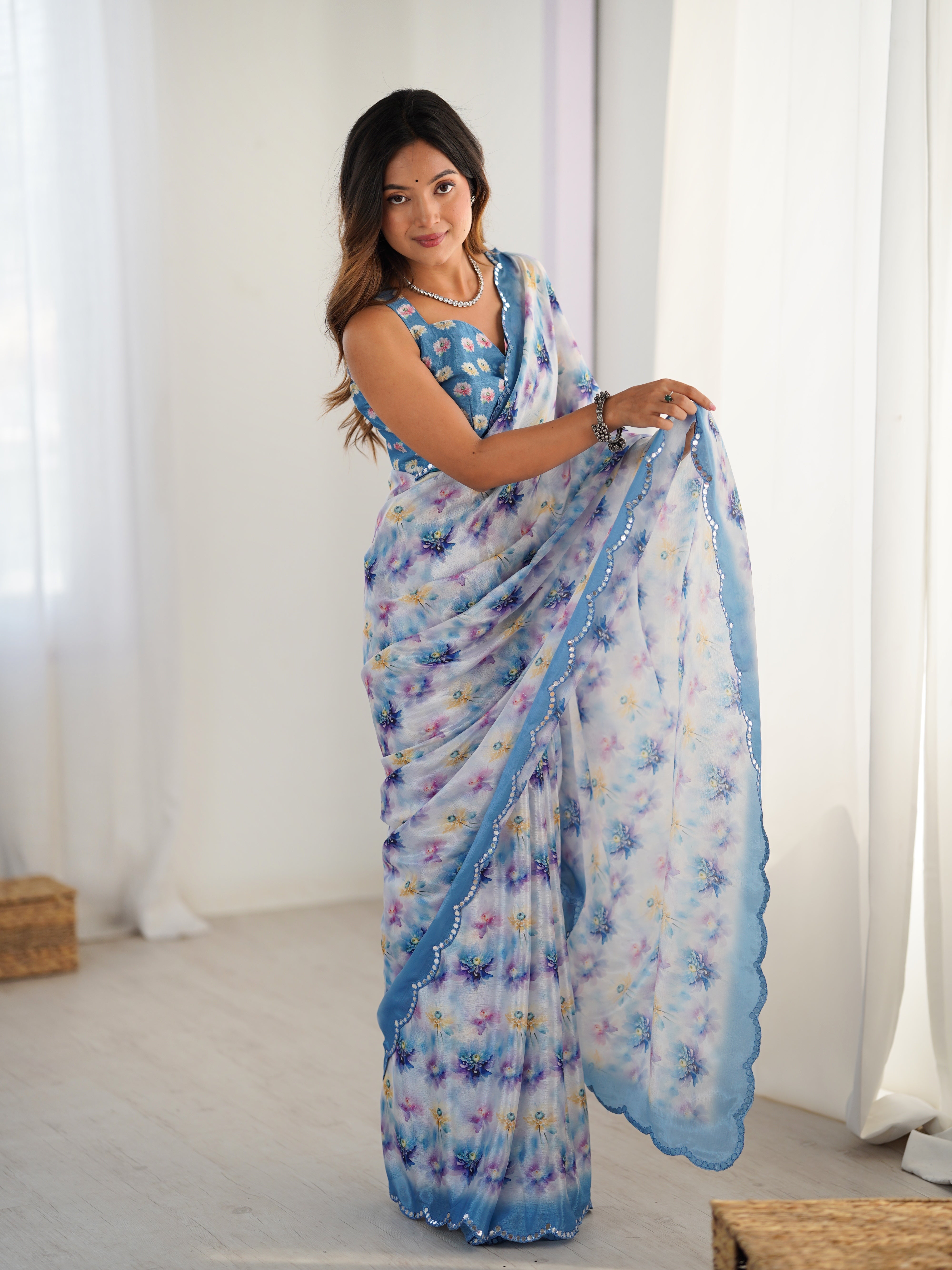 Exquisite Chinnon Saree DVS-52 by TRENDBUY, with floral print and Kutchi mirror work lace border.