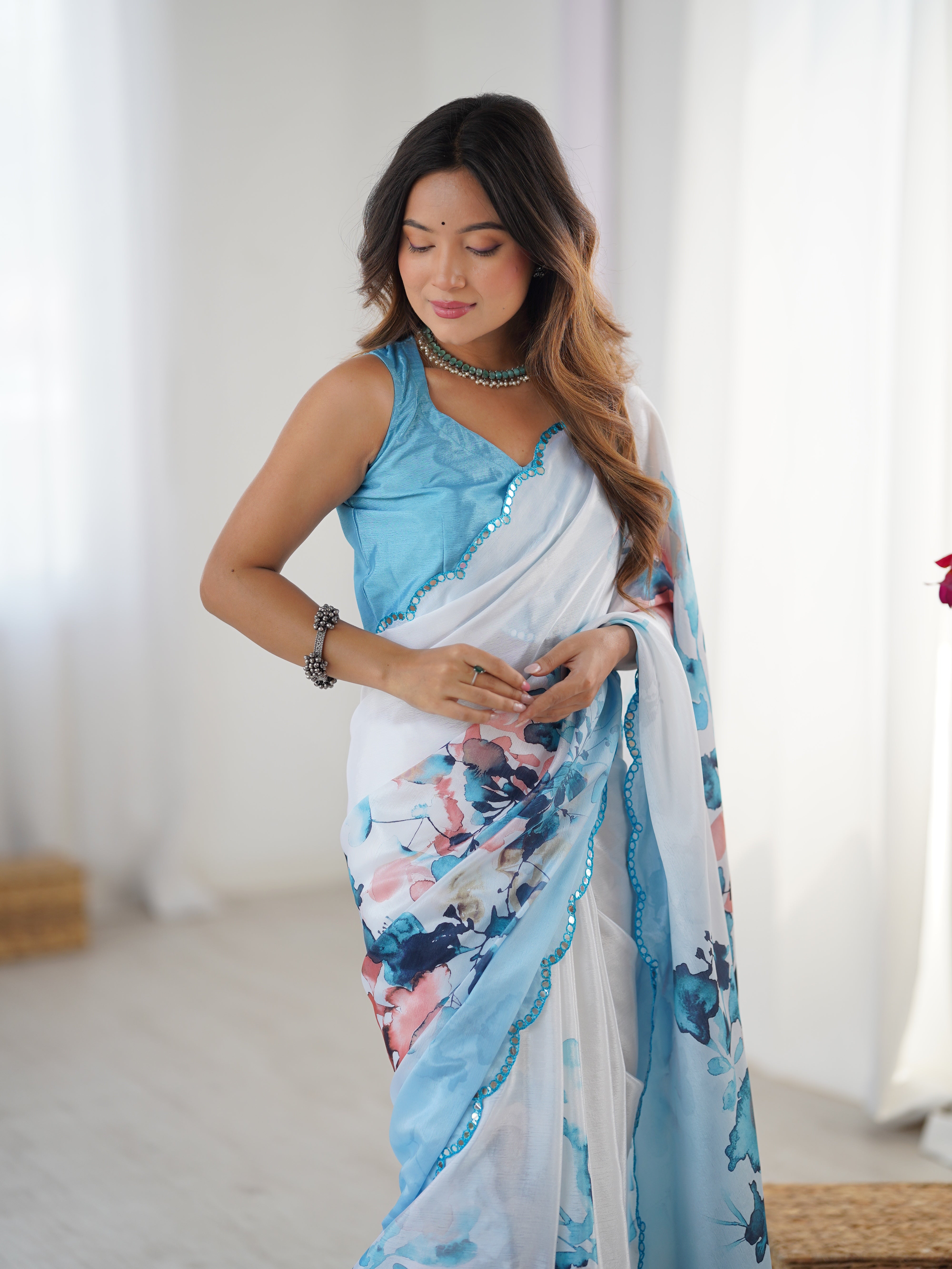 Elegant Heavy Chinnon Saree detail showcasing Kutchi Mirror Lace Border