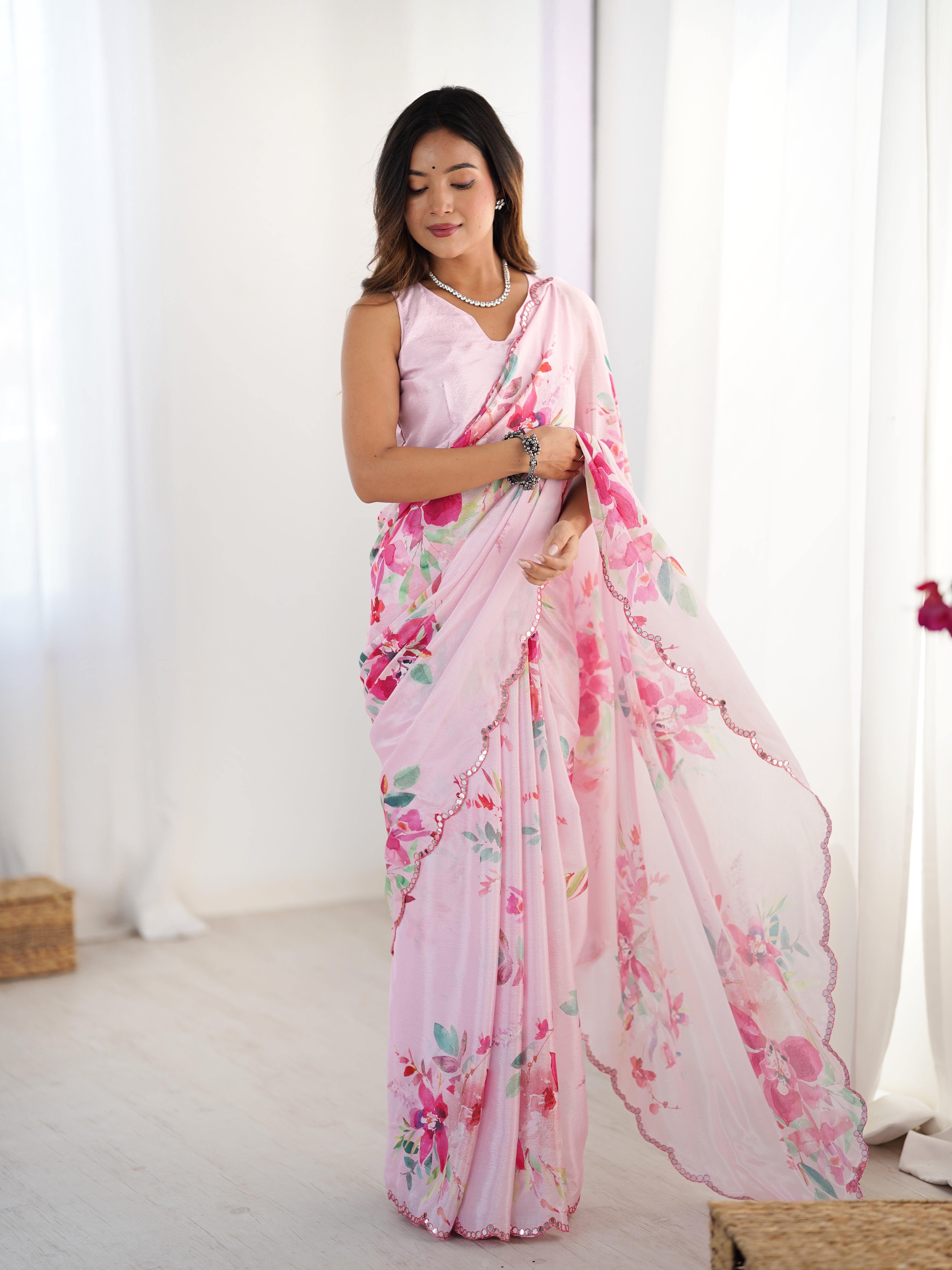 Elegant pink floral print heavy Chinnon saree with Kutchi mirror lace border