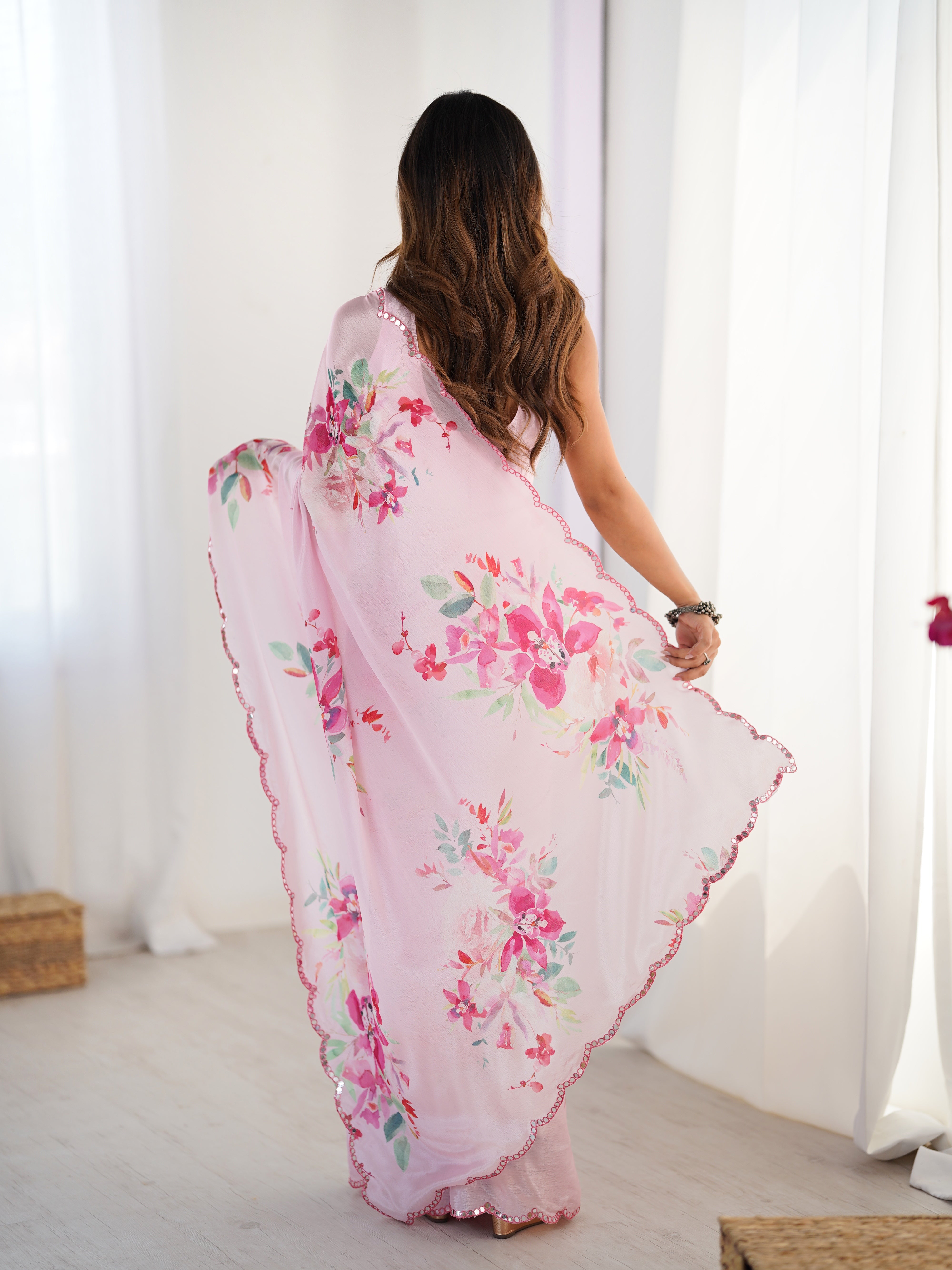 Elegant pink floral print heavy chinnon saree with Kutchi mirror lace border