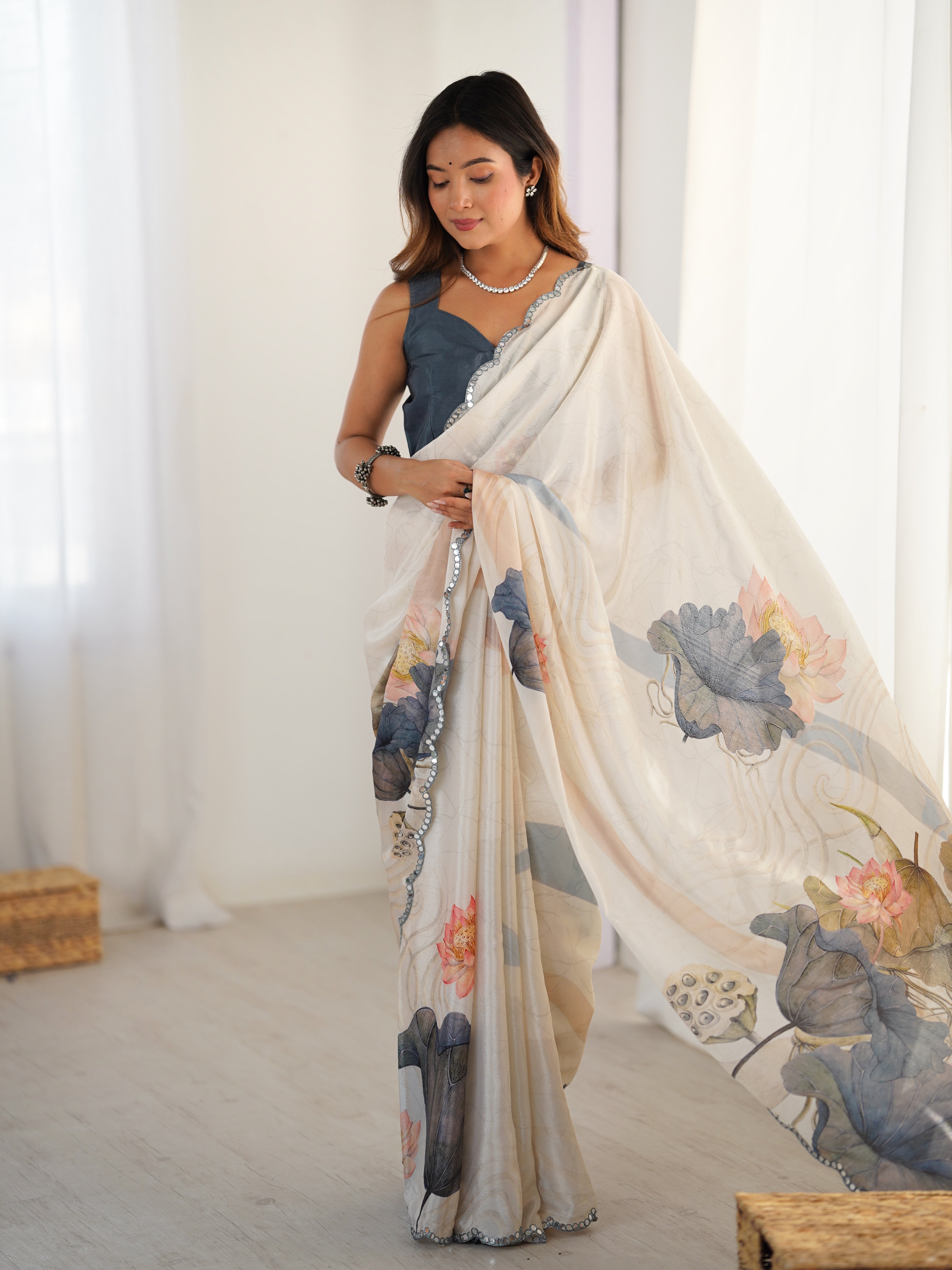 Heavy Chinnon Saree with elegant lotus print & dazzling Kutchi mirror lace border