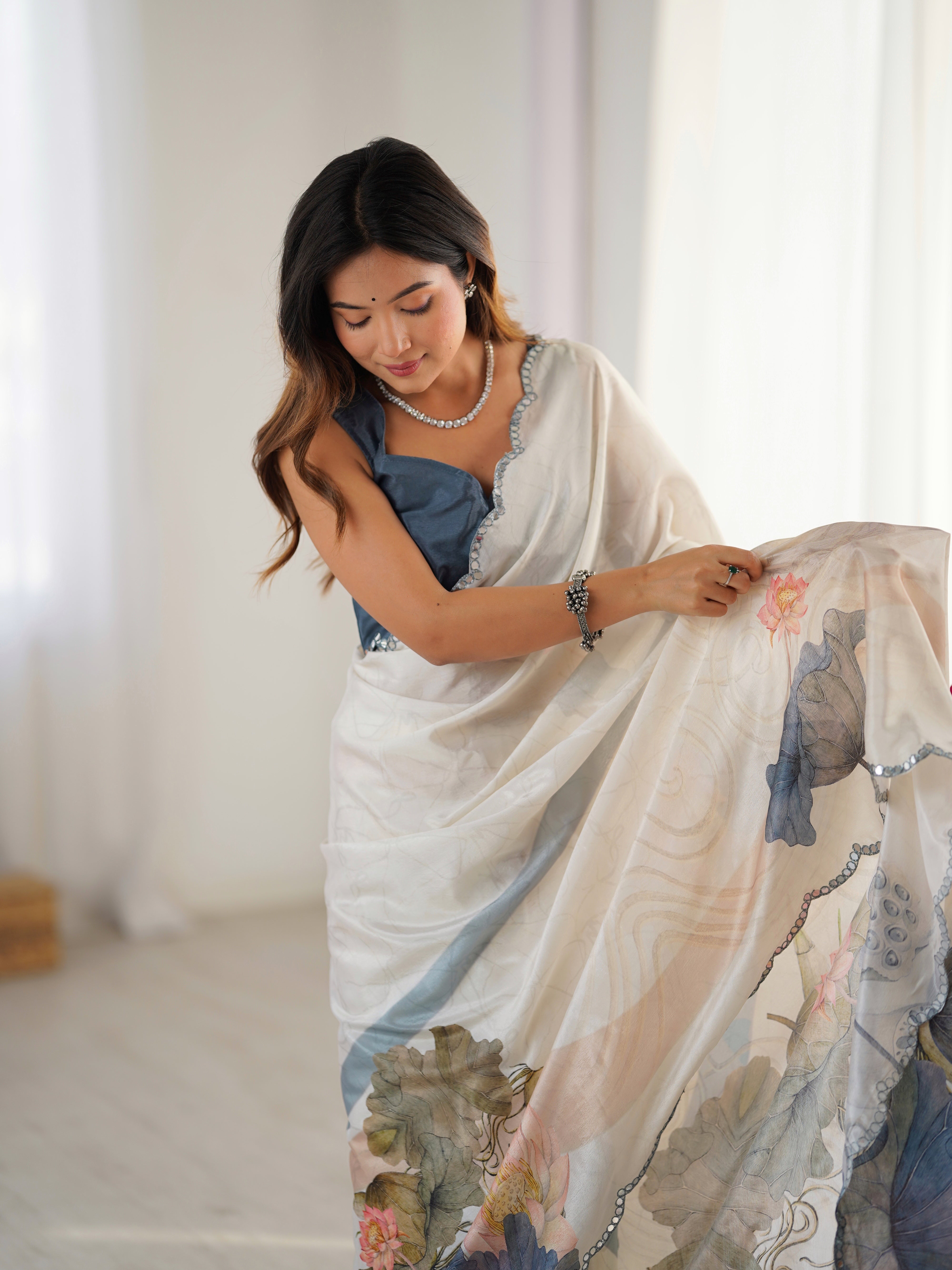 TRENDBUY Heavy Chinnon Saree DVS-57 with elegant lotus print and dazzling Kutchi mirror lace border.