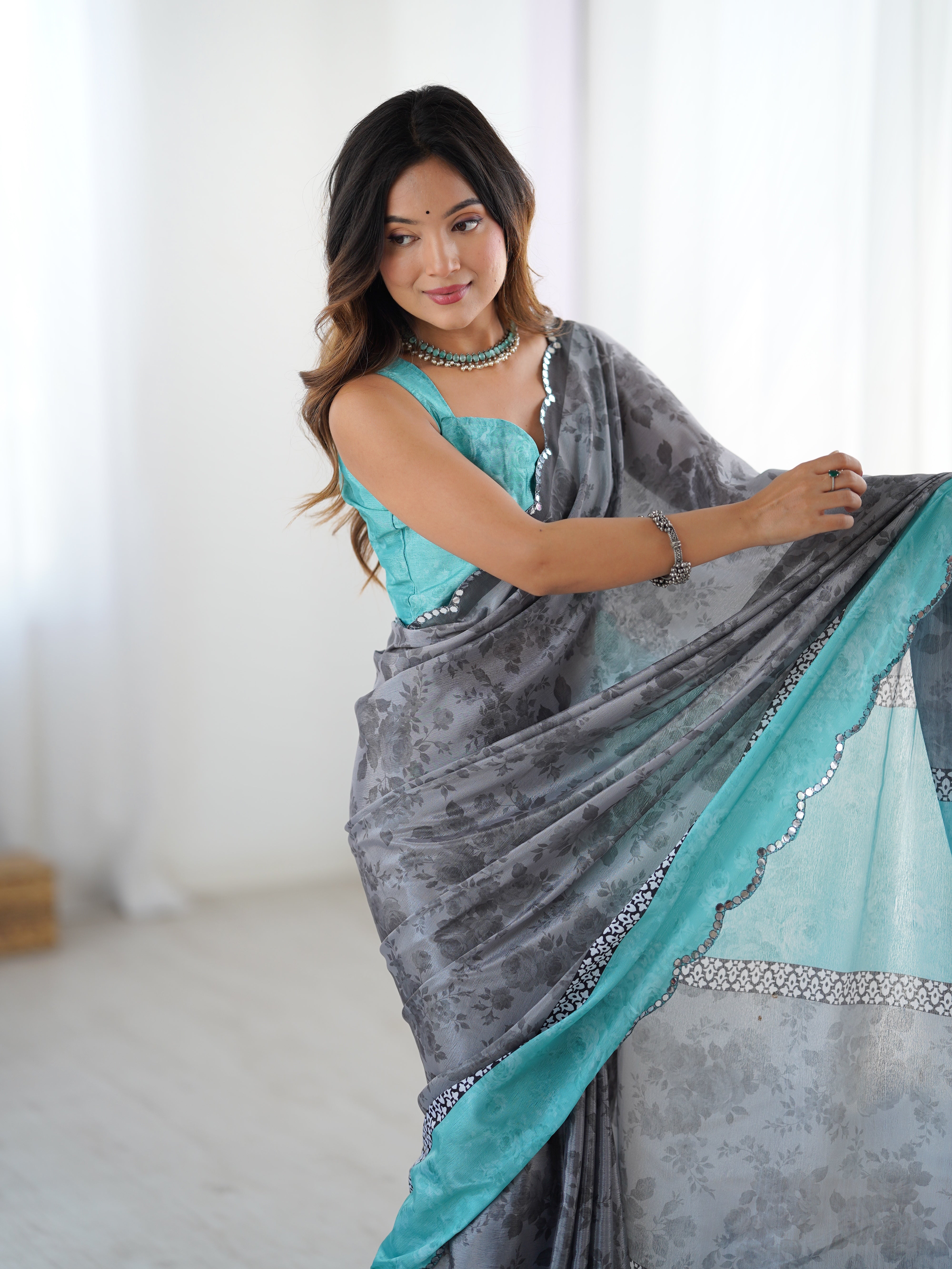 TRENDBUY DVS-58 Heavy Chinnon floral print saree with Kutchi work mirror lace border.