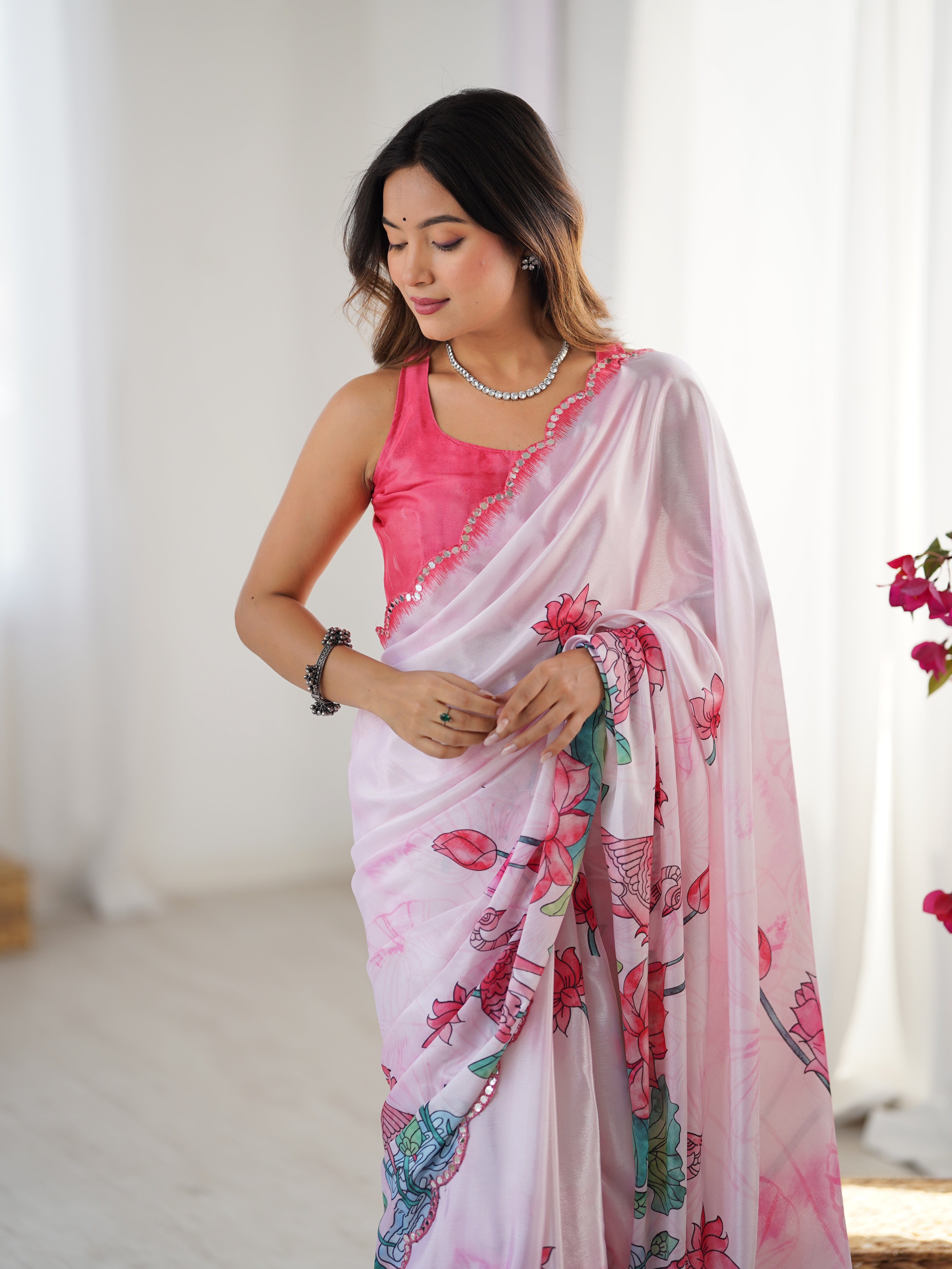 Pink Chinnon Saree with vibrant prints & Kutchi mirror work lace border