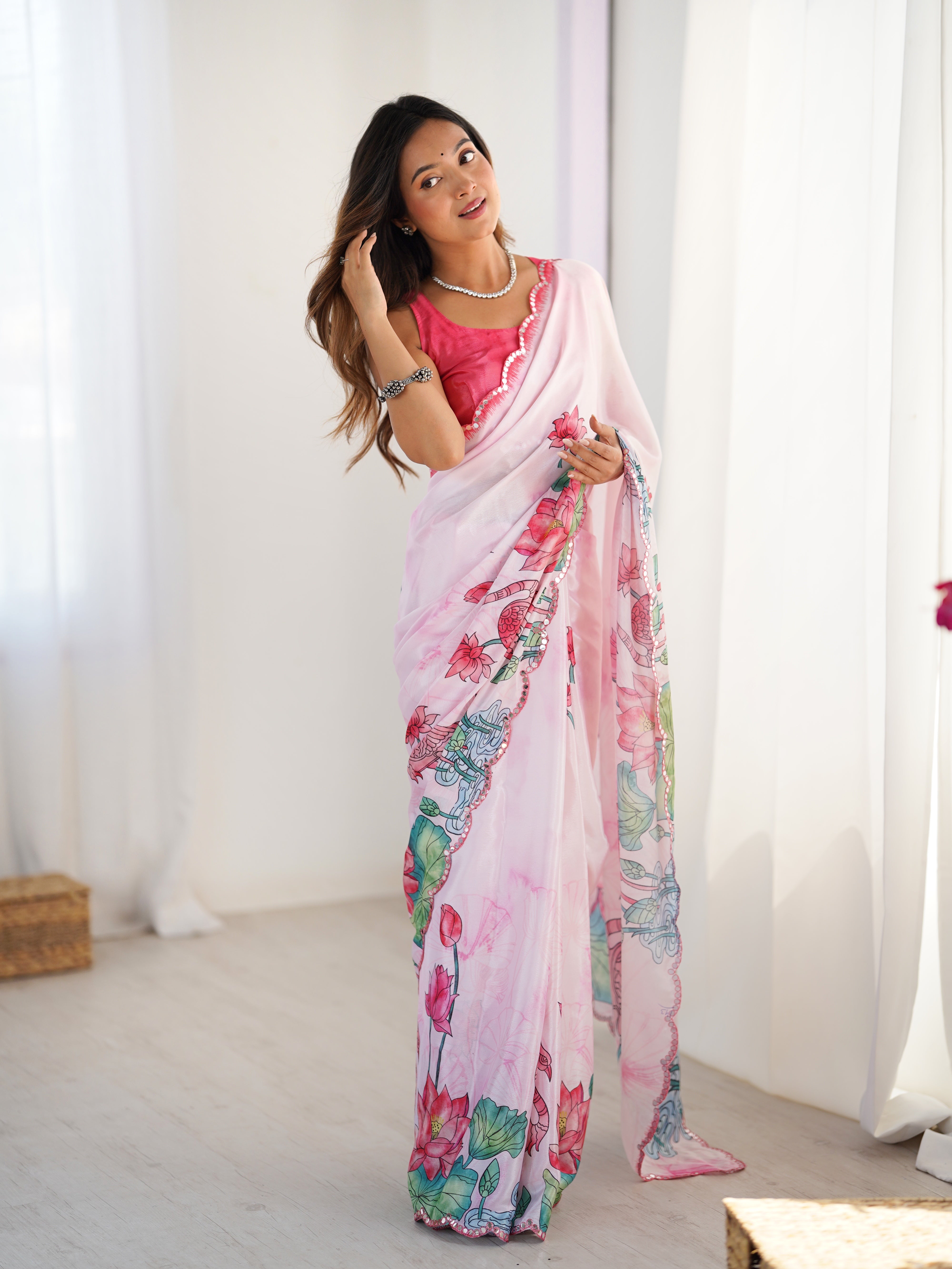 Elegant Pink Chinnon Saree with vibrant prints & Kutchi mirror work border