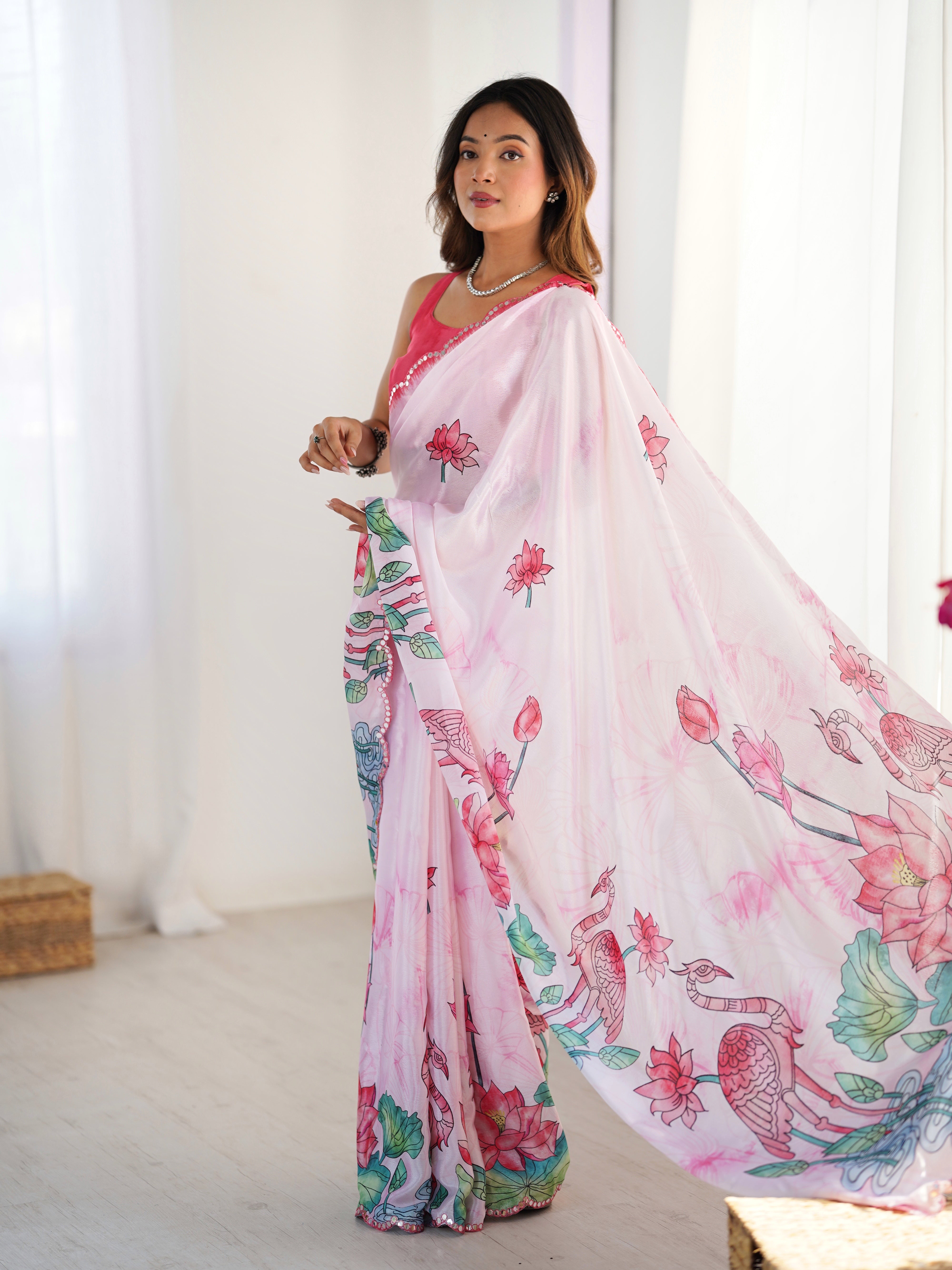 Elegant Pink Chinnon Saree with vibrant prints and Kutchi mirror work lace border