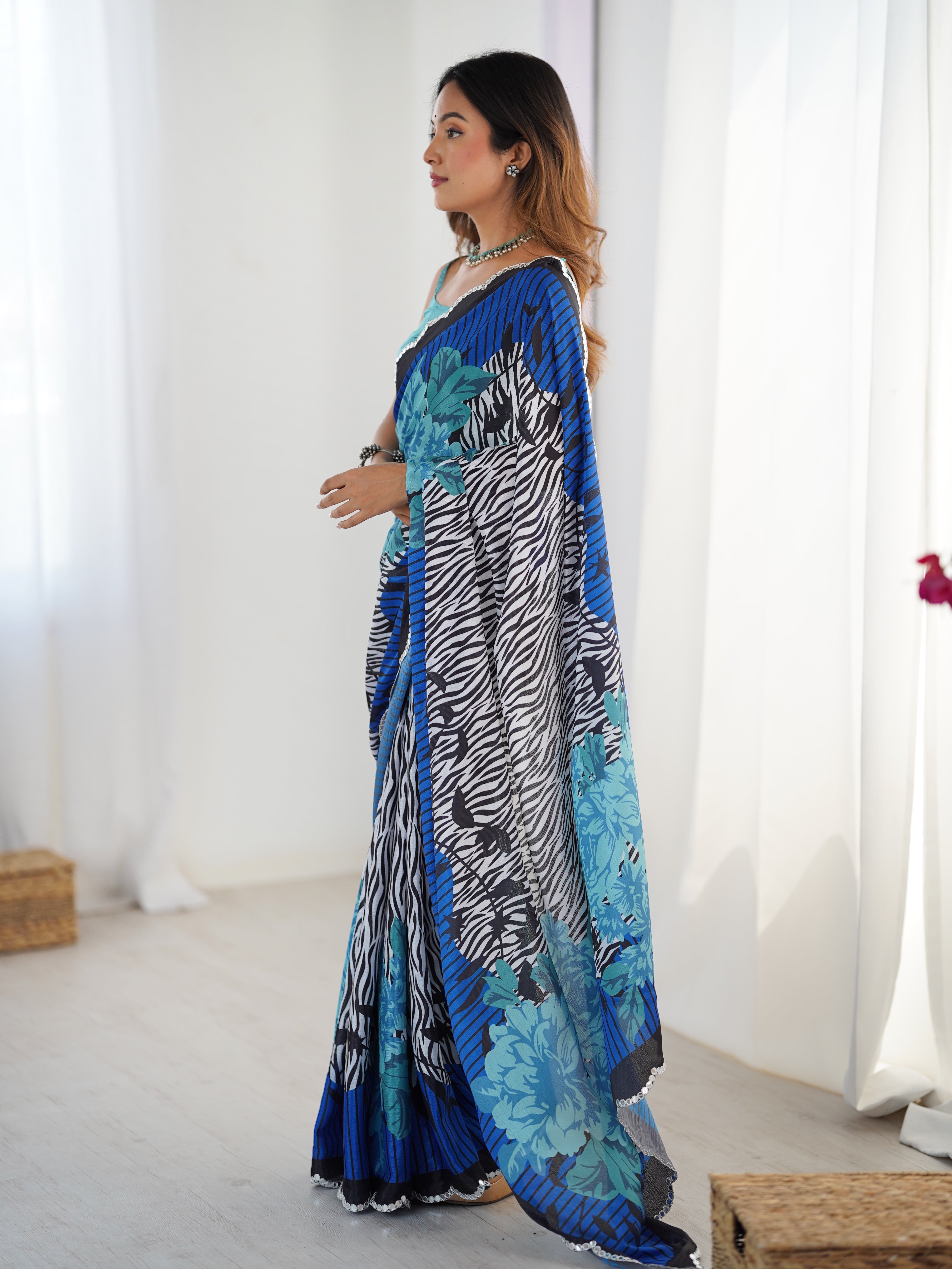TRENDBUY Heavy Chinnon Saree with vibrant print and Kutchi work mirror lace border