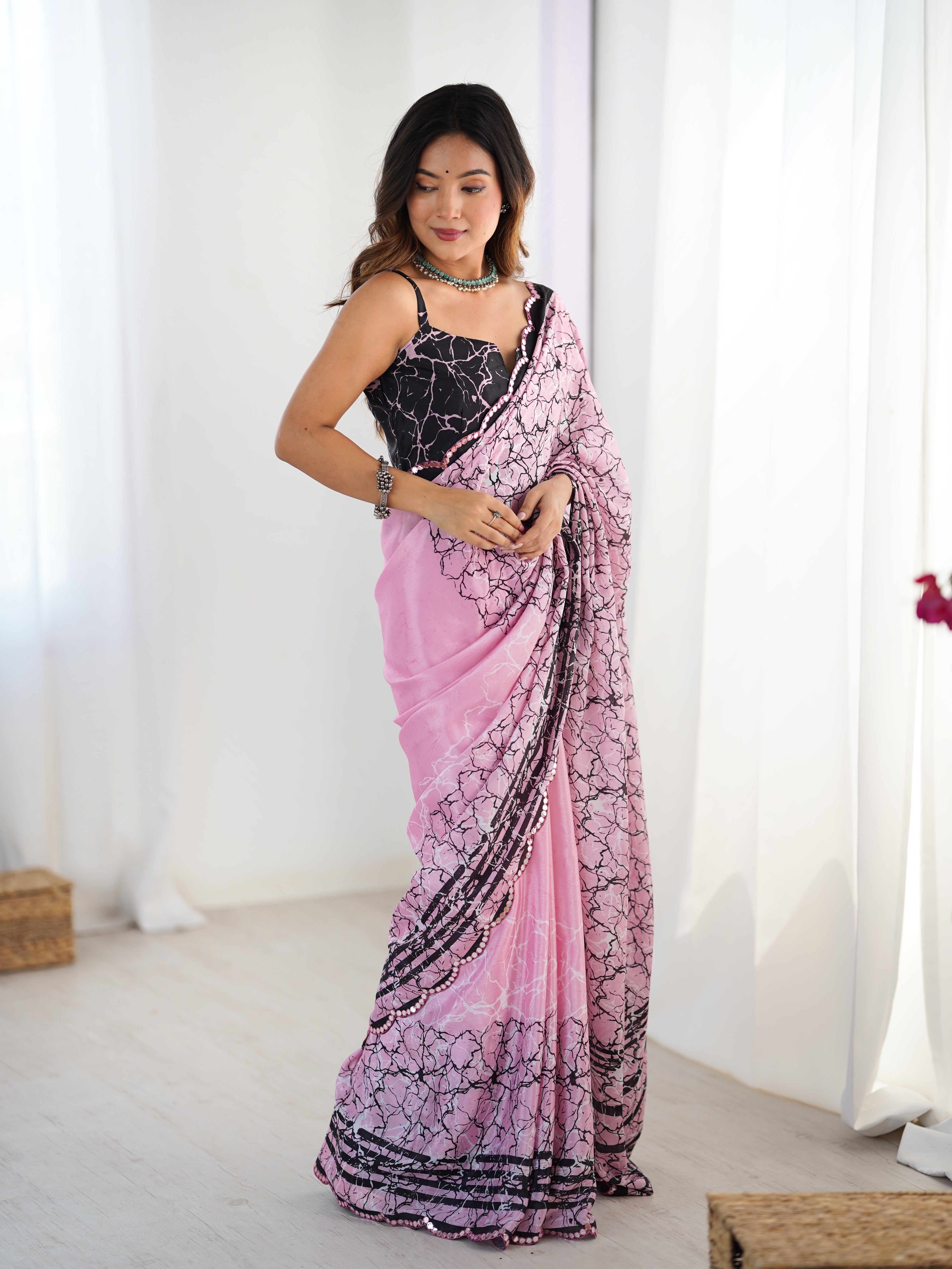 Elegant Pink Chinnon Saree with Black Print & Kutchi Mirror Lace Border