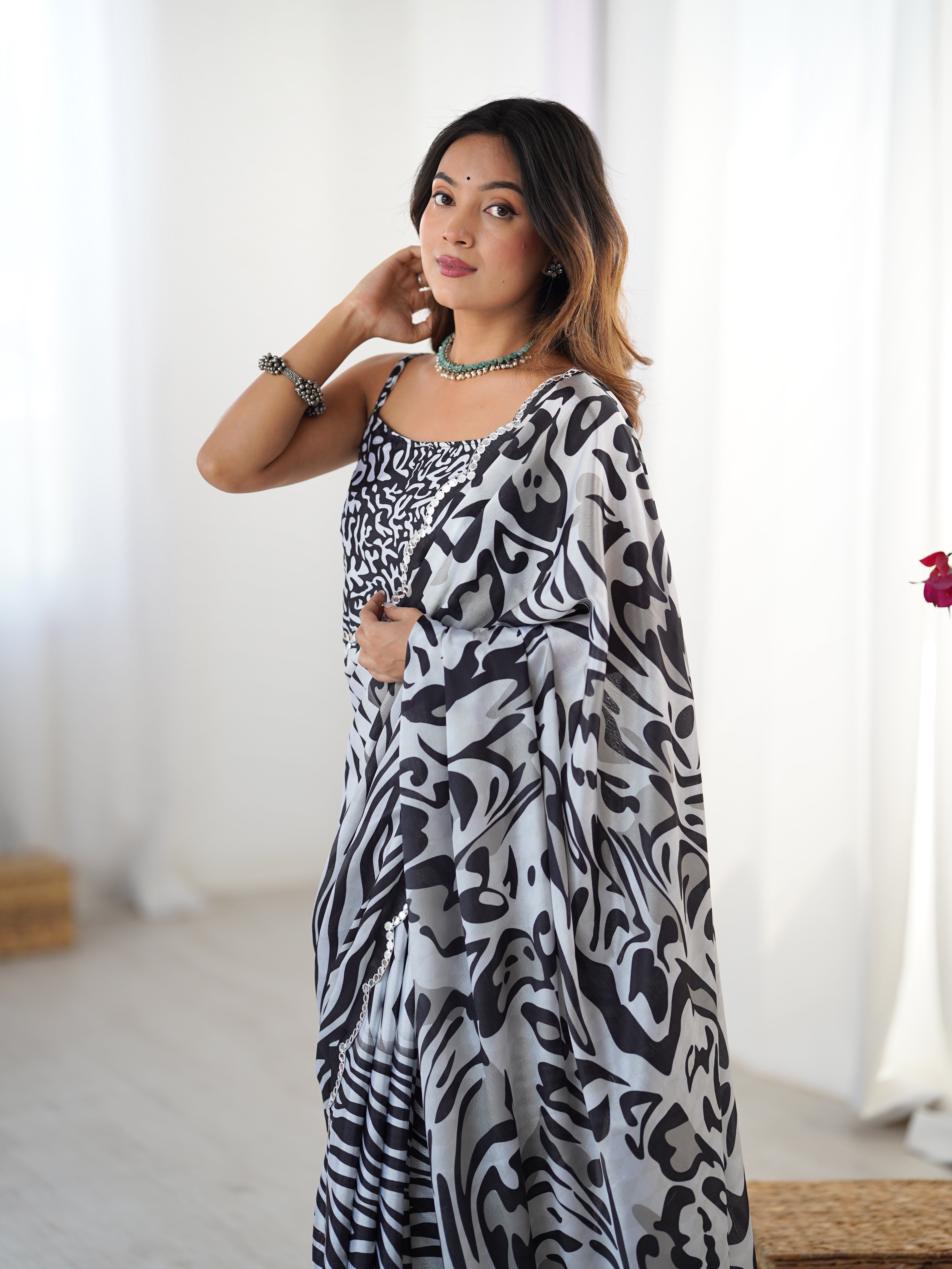 Chic Black & White Chinnon Saree with Kutchi Mirror Lace Border