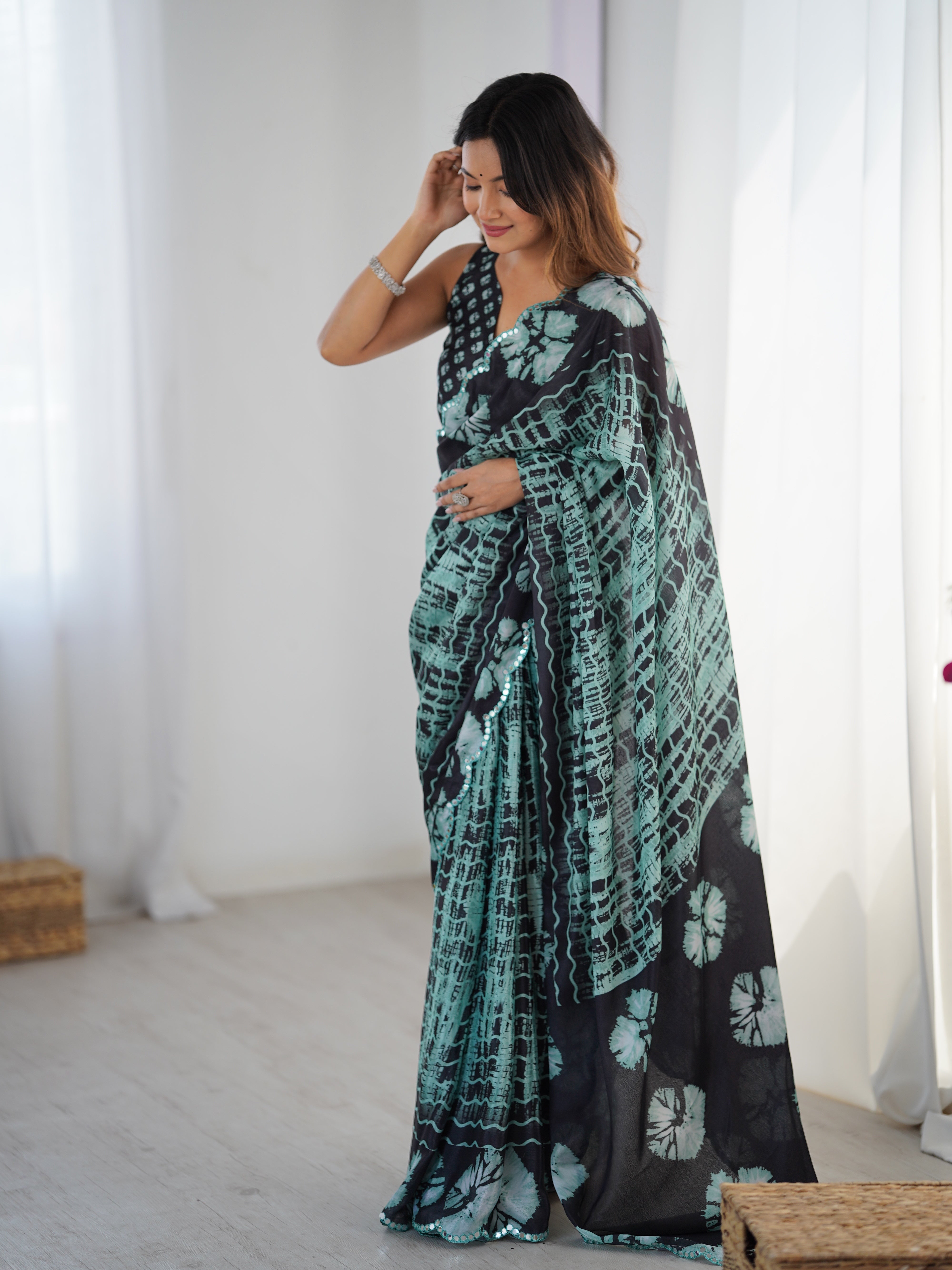 Elegant Heavy Chinnon Saree with intricate Kutchi Mirror Work Border