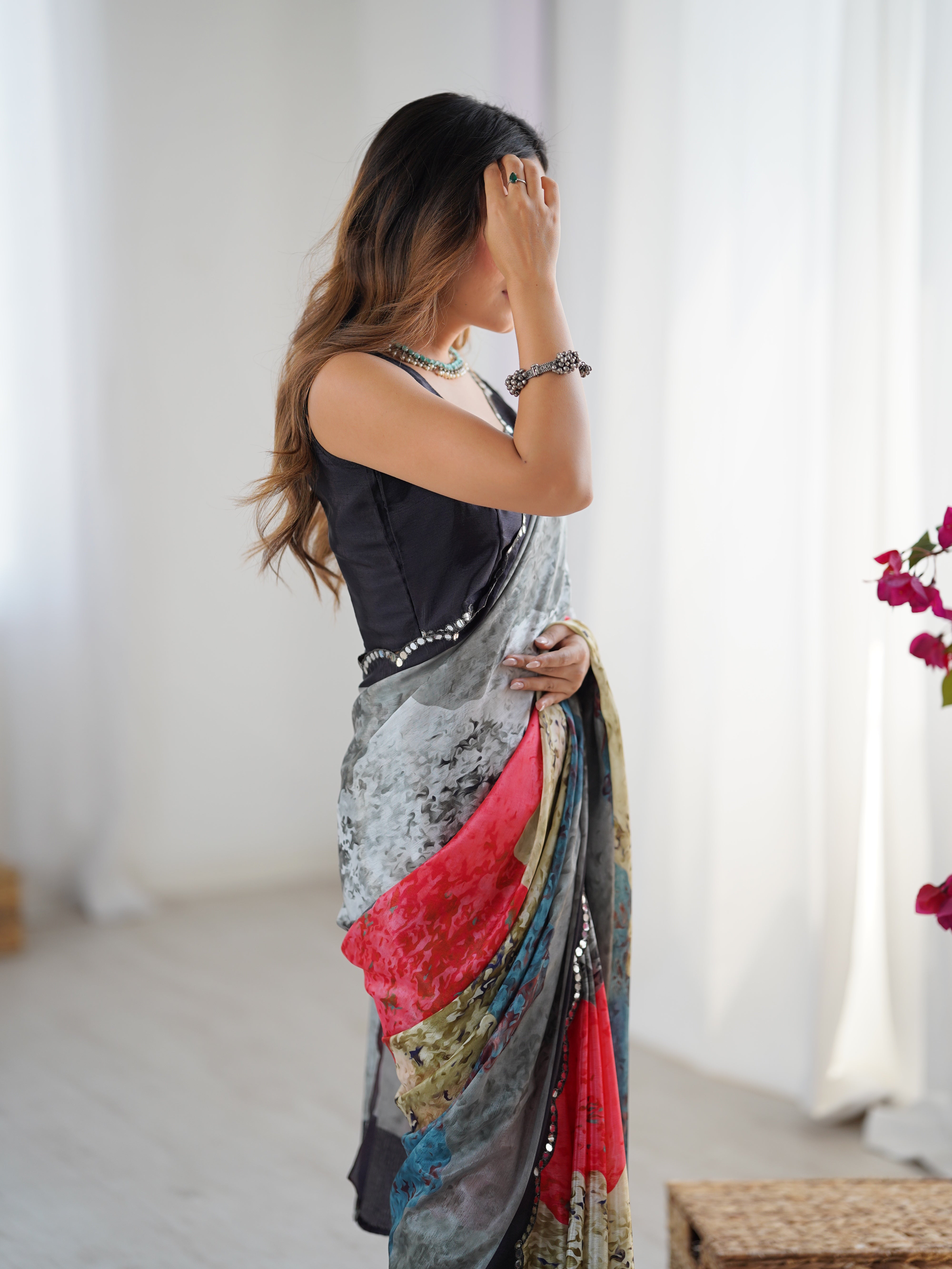 Heavy Chinnon Saree with vibrant print and Kutchi mirror work border