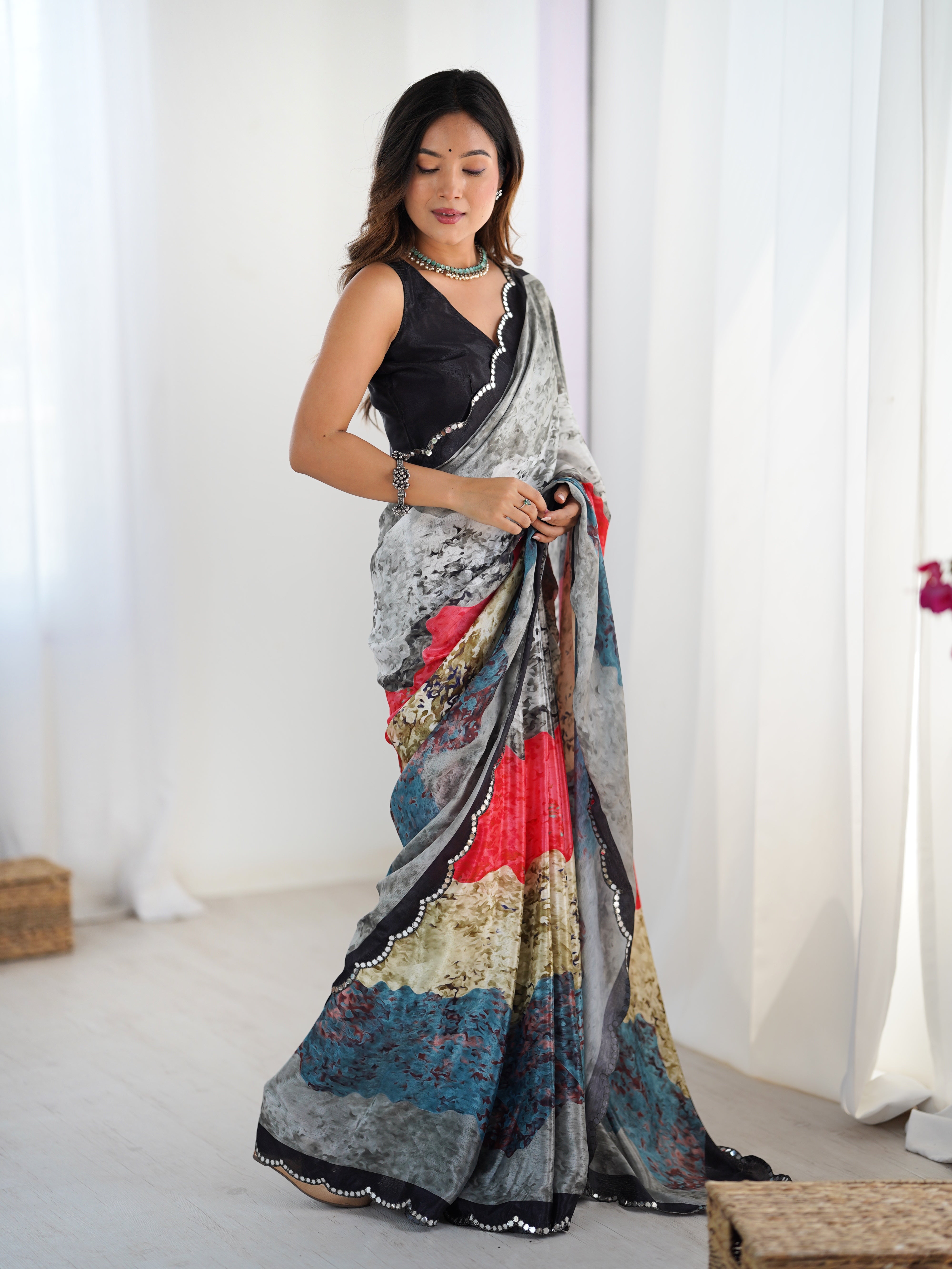 TRENDBUY DVS-79 heavy Chinnon saree, vibrant print & Kutchi mirror work border.