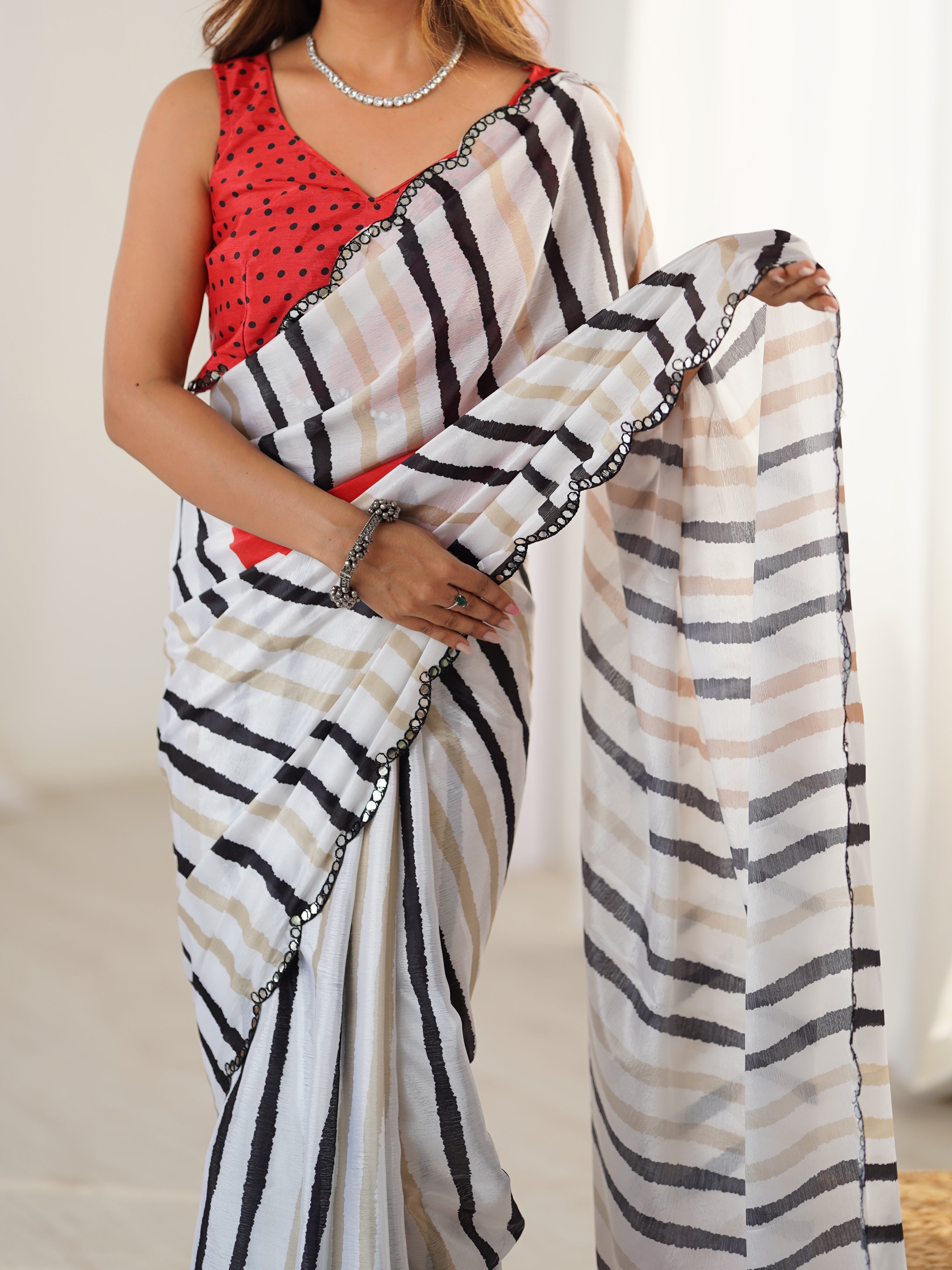 TRENDBUY DVS-80 striped Chinnon saree with mirror work border, on model