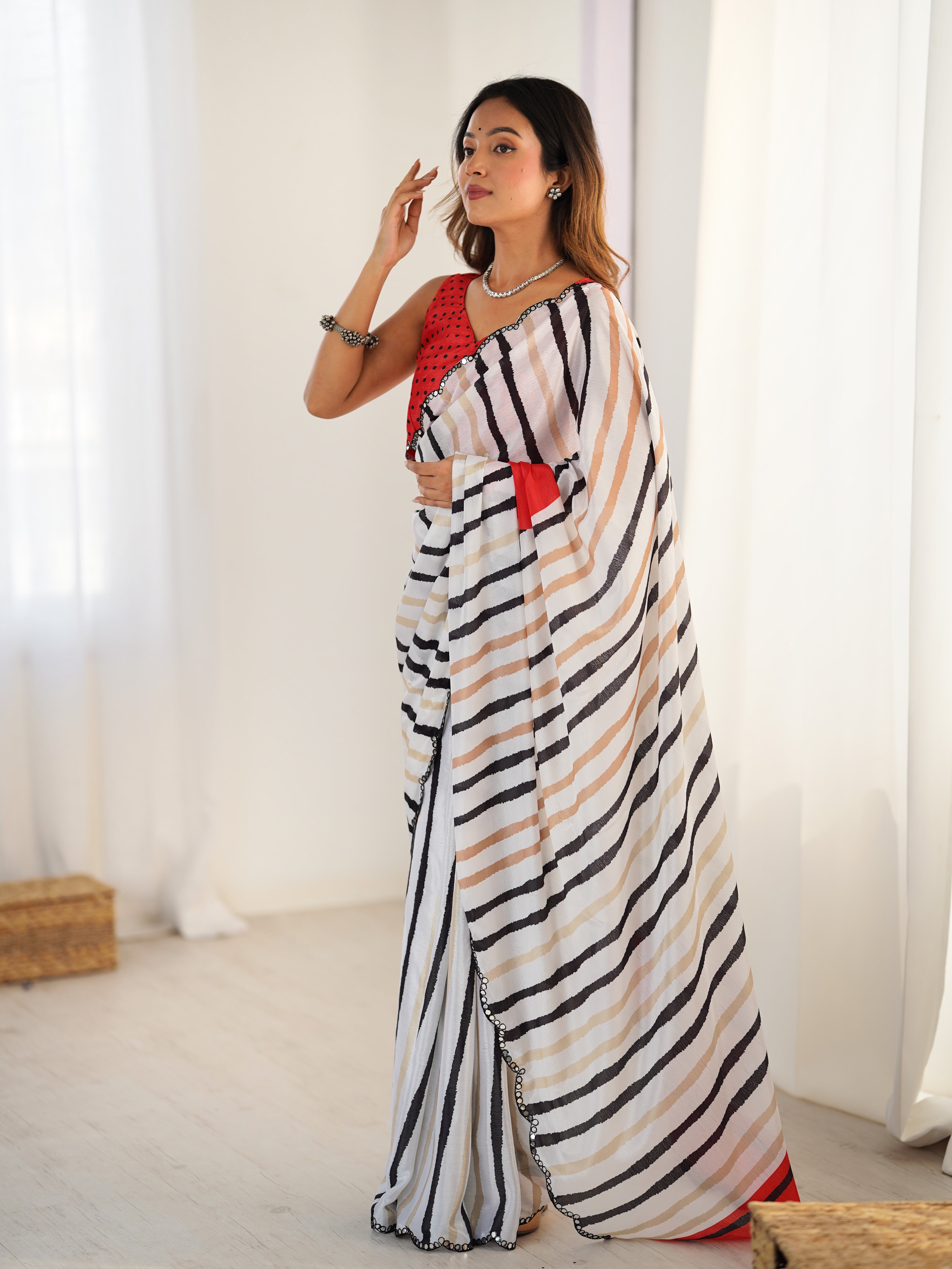 TRENDBUY DVS-80 Striped Chinnon Saree with mirror work border and unstitched blouse.