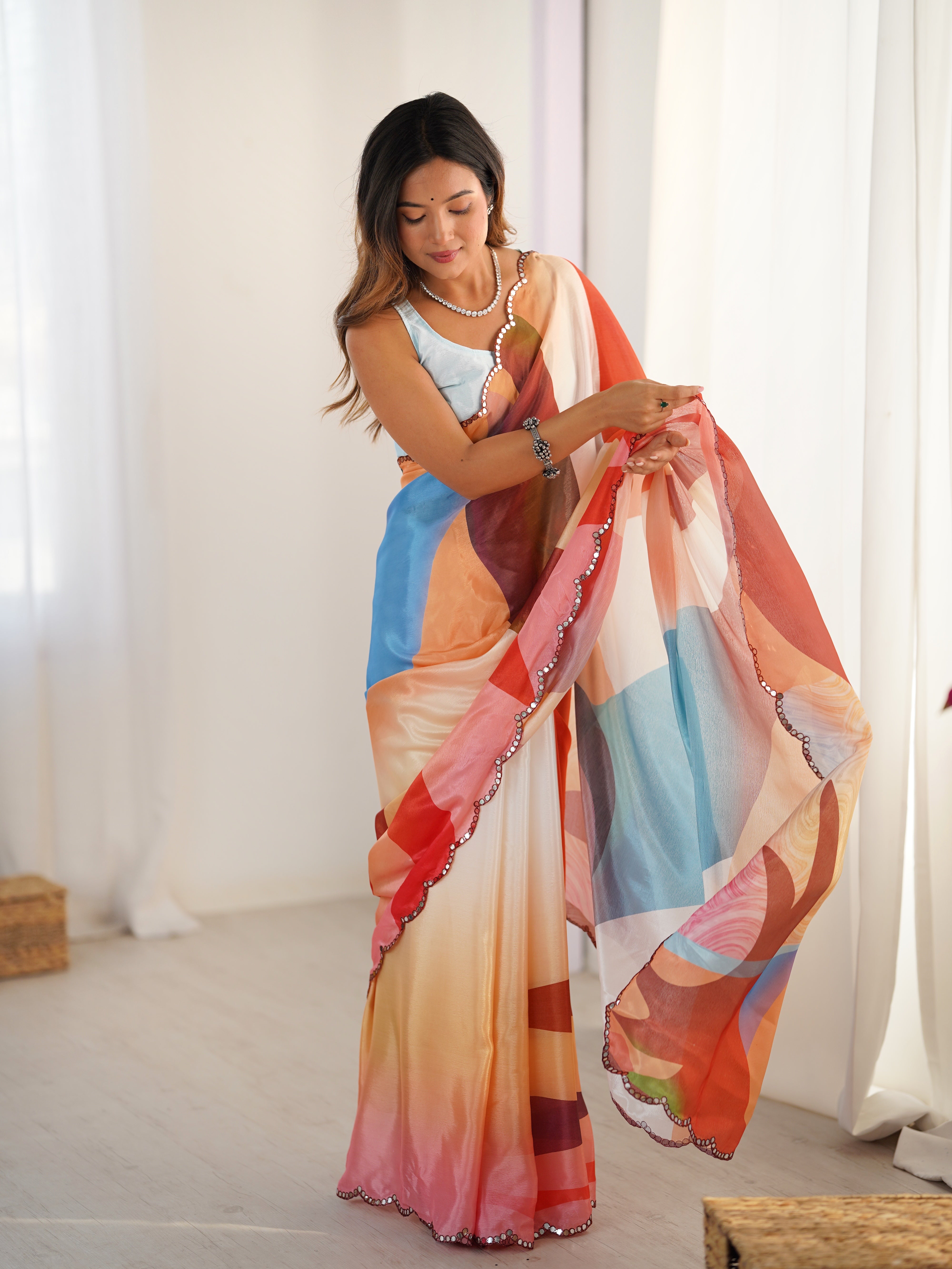 Heavy Chinnon Saree with Vibrant Print & Kutchi Mirror Work Border