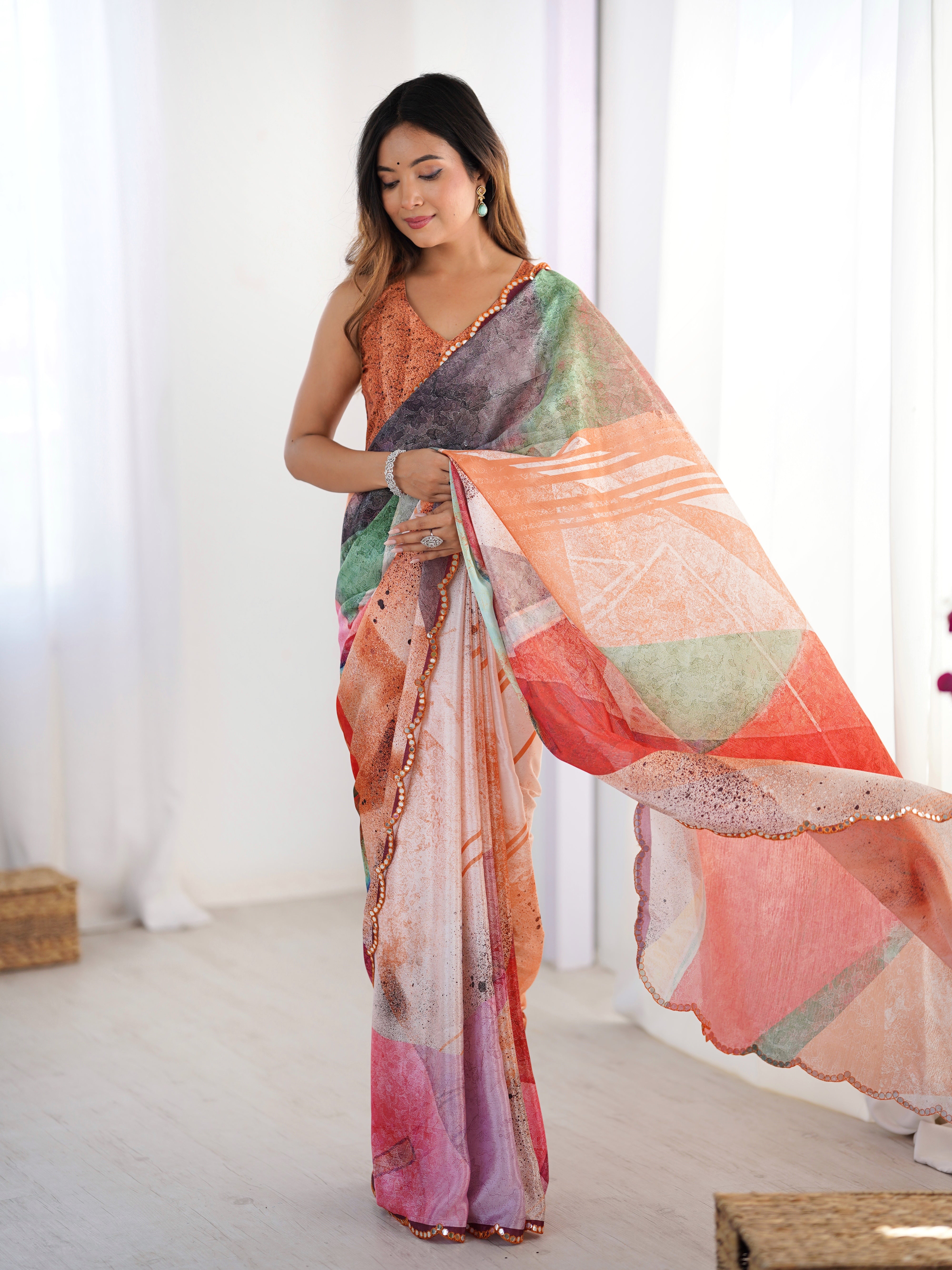 TRENDBUY DVS-82 vibrant abstract print heavy chinnon saree featuring Kutchi mirror lace border