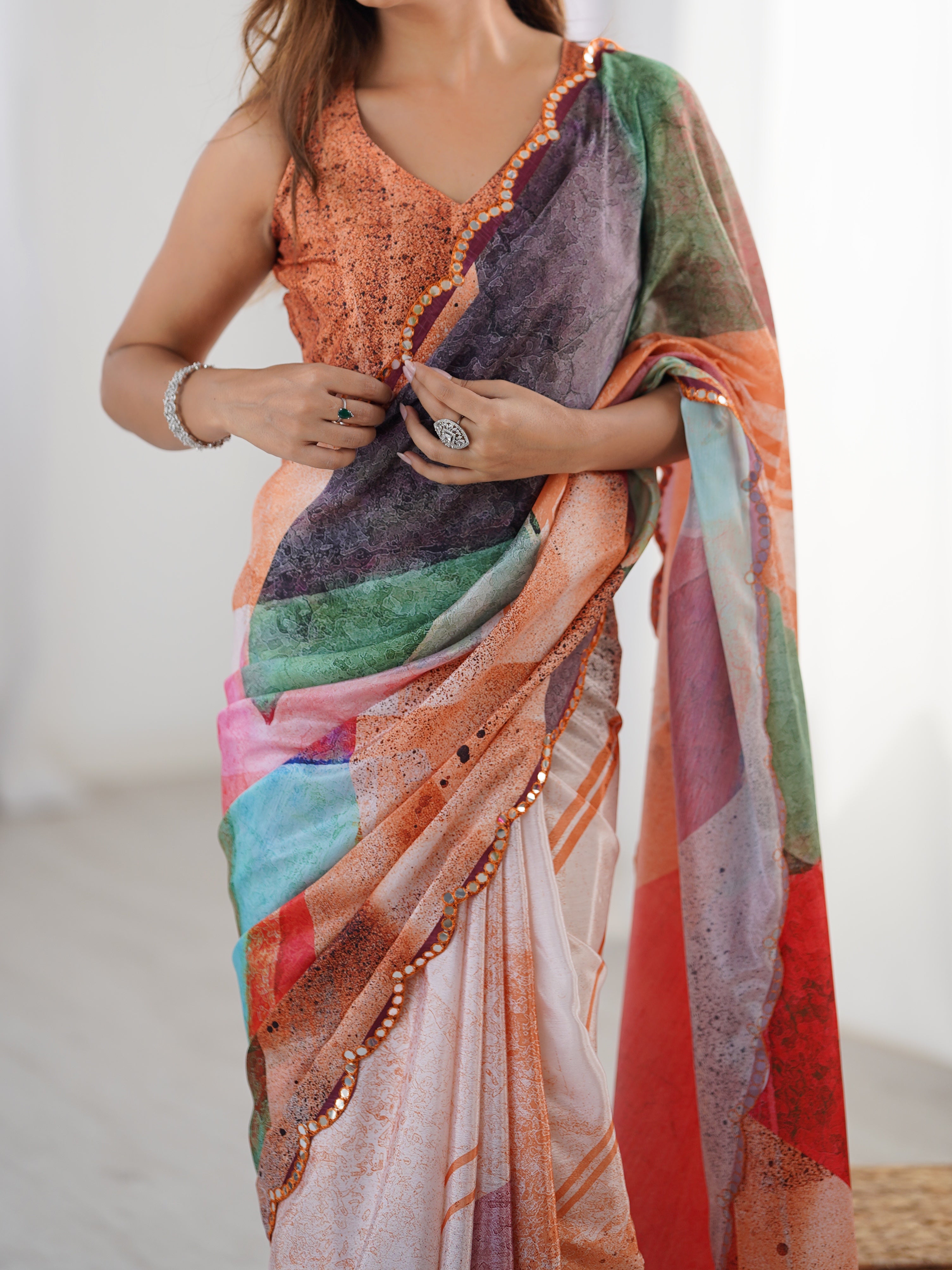 Vibrant abstract print Chinnon saree with Kutchi mirror lace border