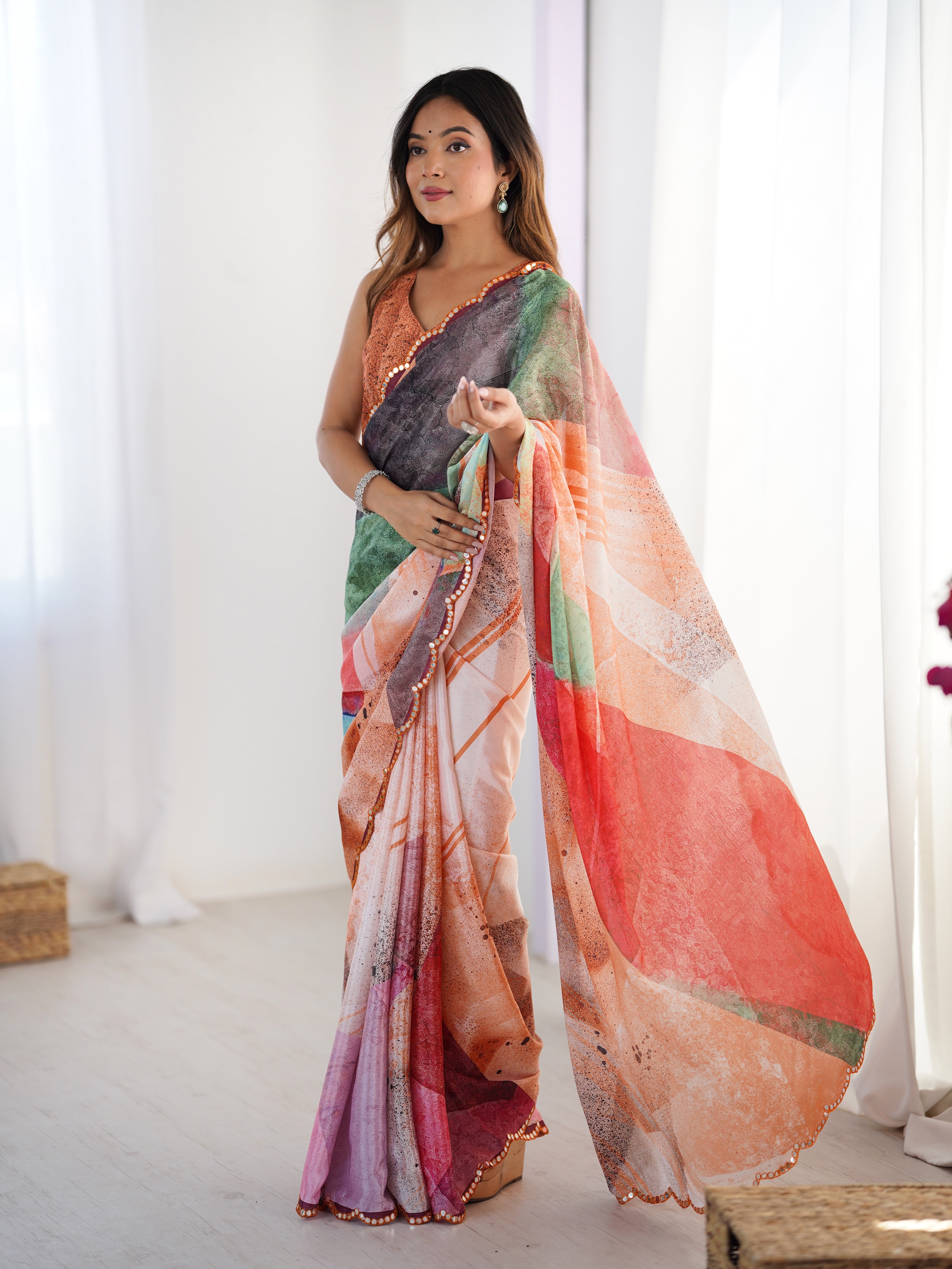 TRENDBUY DVS-82 vibrant abstract print heavy chinnon saree with Kutchi mirror lace border detail.