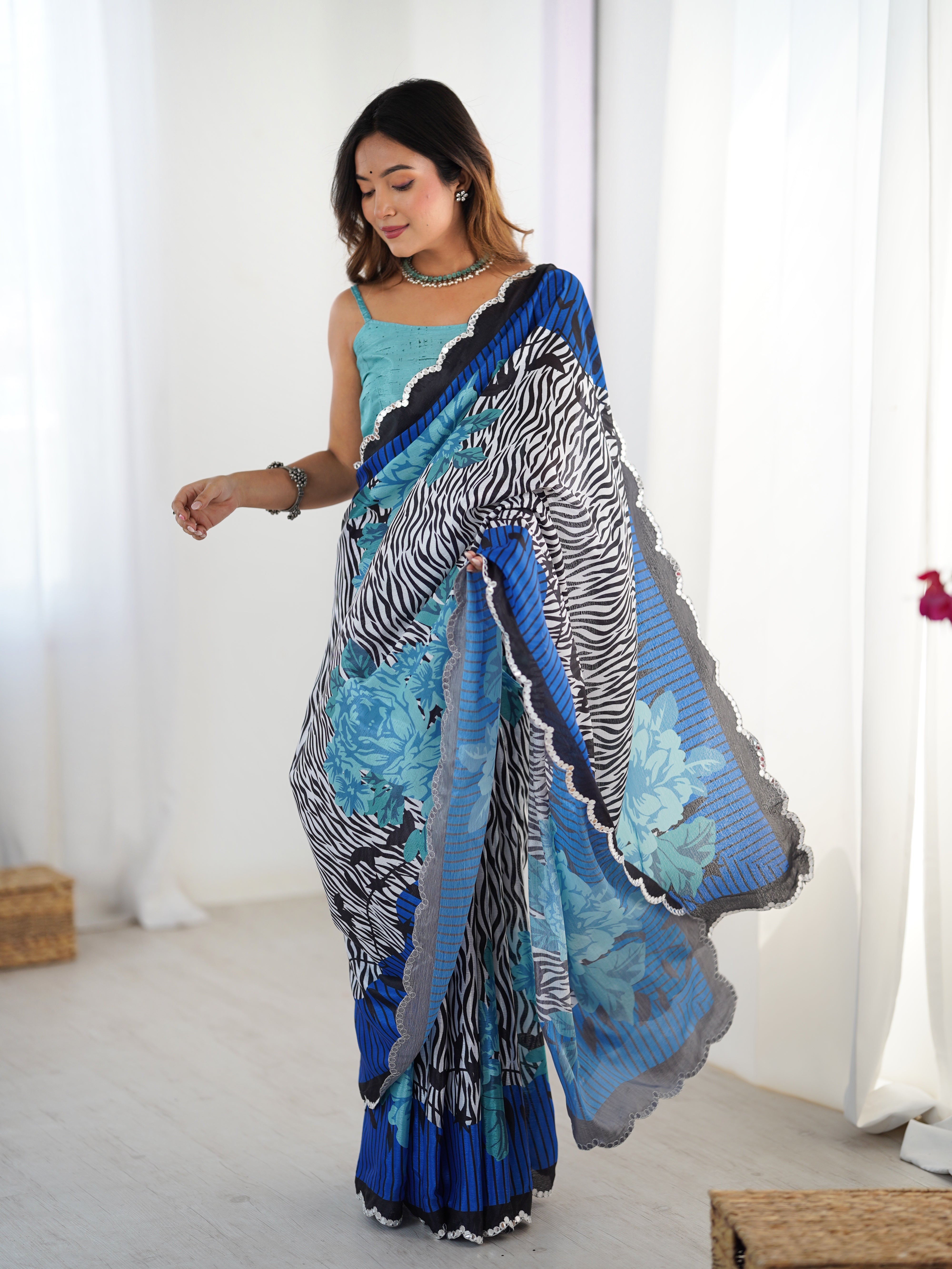 Exquisite Chinnon Saree DVS-84 with vibrant print and Kutchi mirror lace border