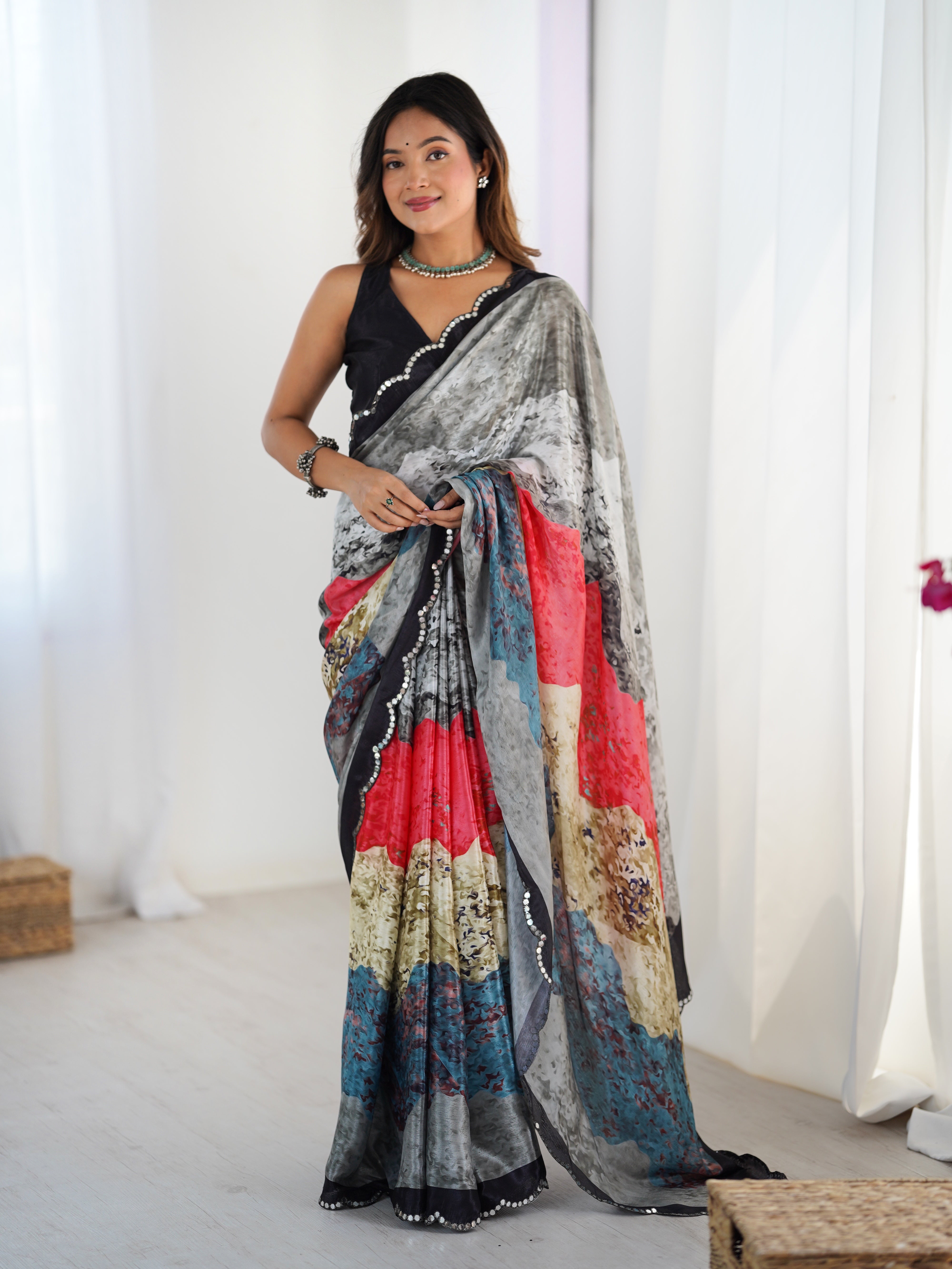 TRENDBUY Exclusive Heavy Chinnon Saree with vibrant print and Kutchi mirror lace border