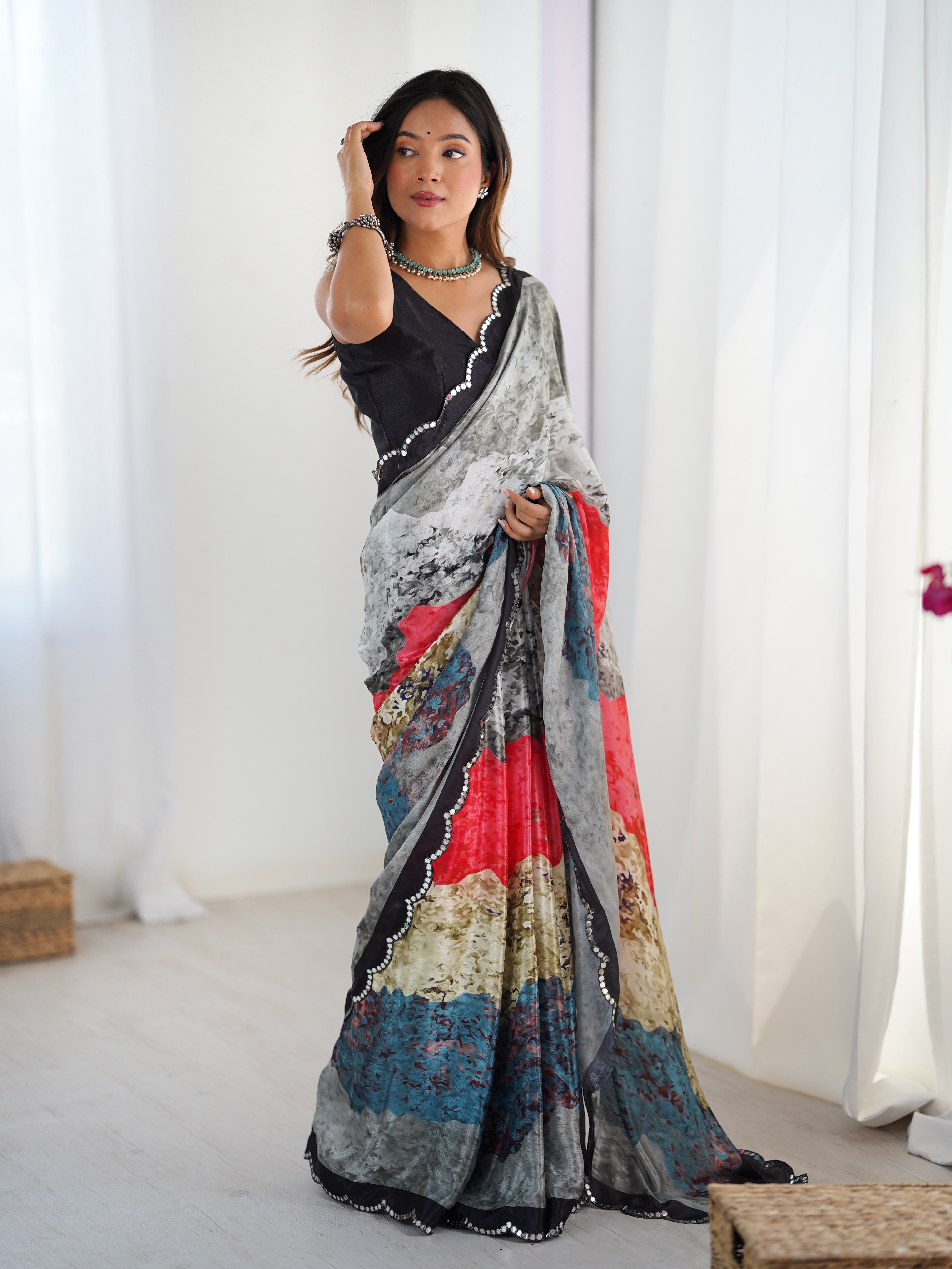 TRENDBUY heavy chinnon saree with vibrant print & Kutchi mirror lace border