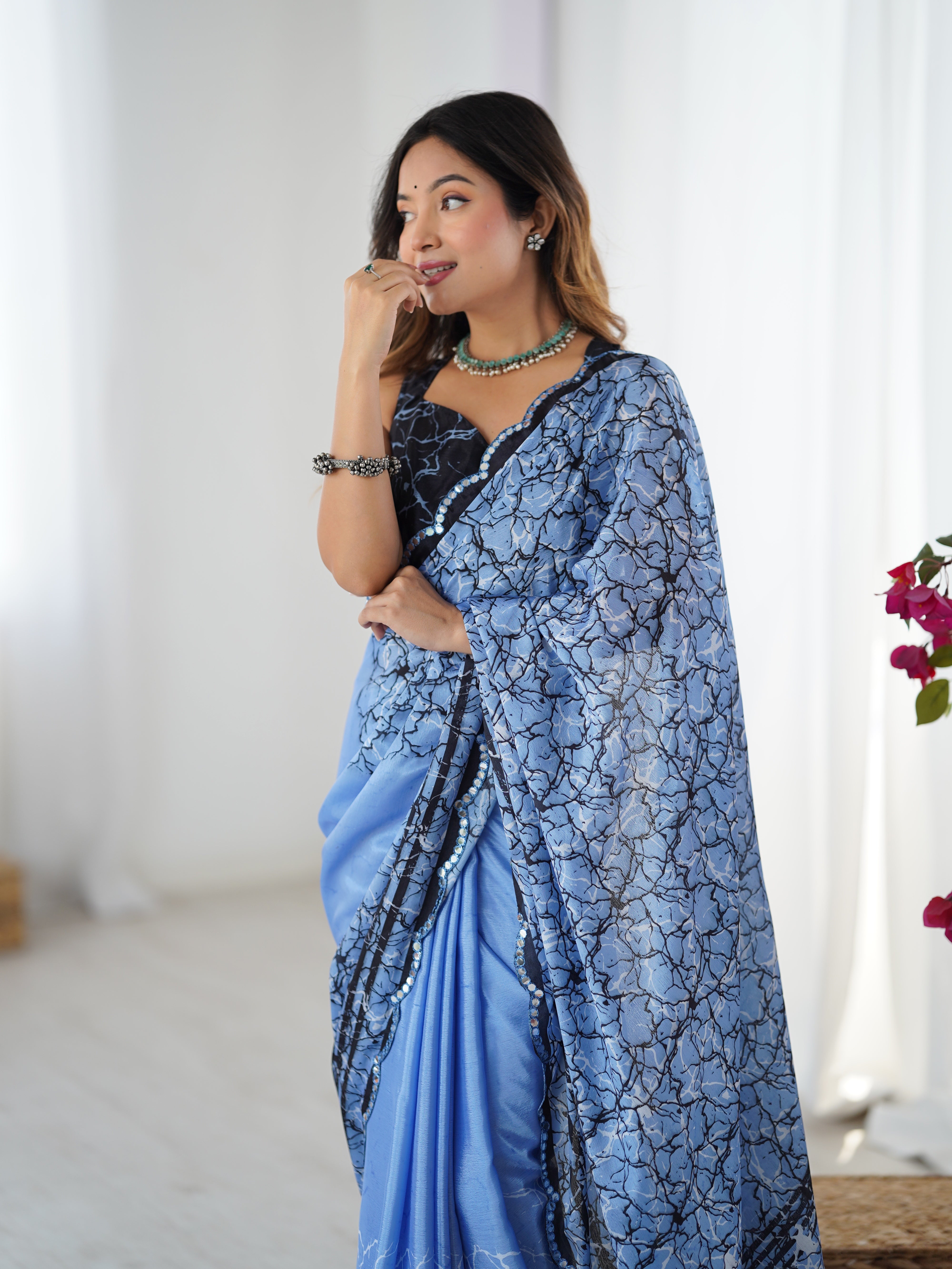 TRENDBUY DVS-89 Heavy Chinnon Saree with intricate Kutchi work & sparkling mirror lace border.