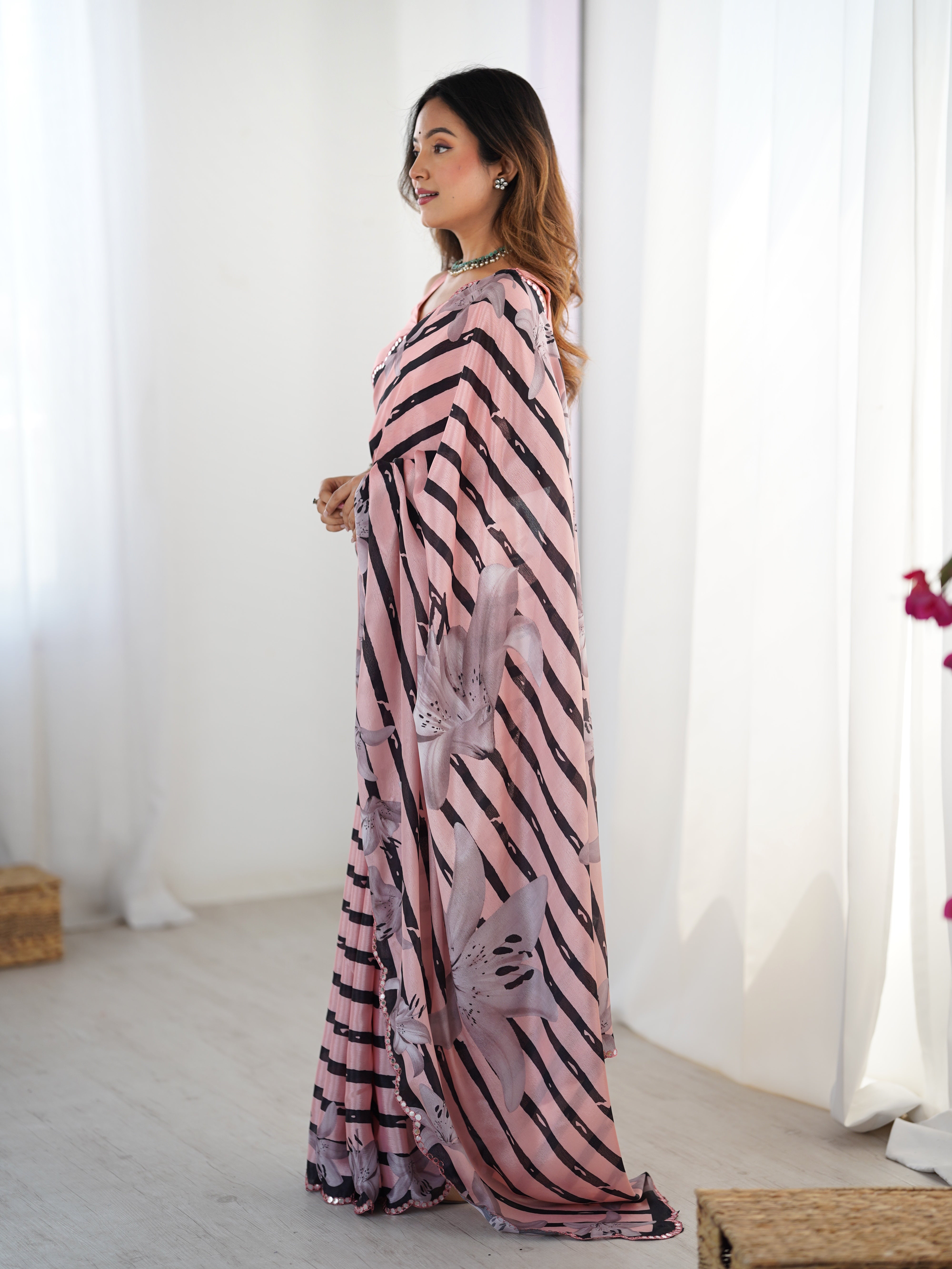 Elegant pink Chinnon saree with Kutchi mirror lace border & floral print