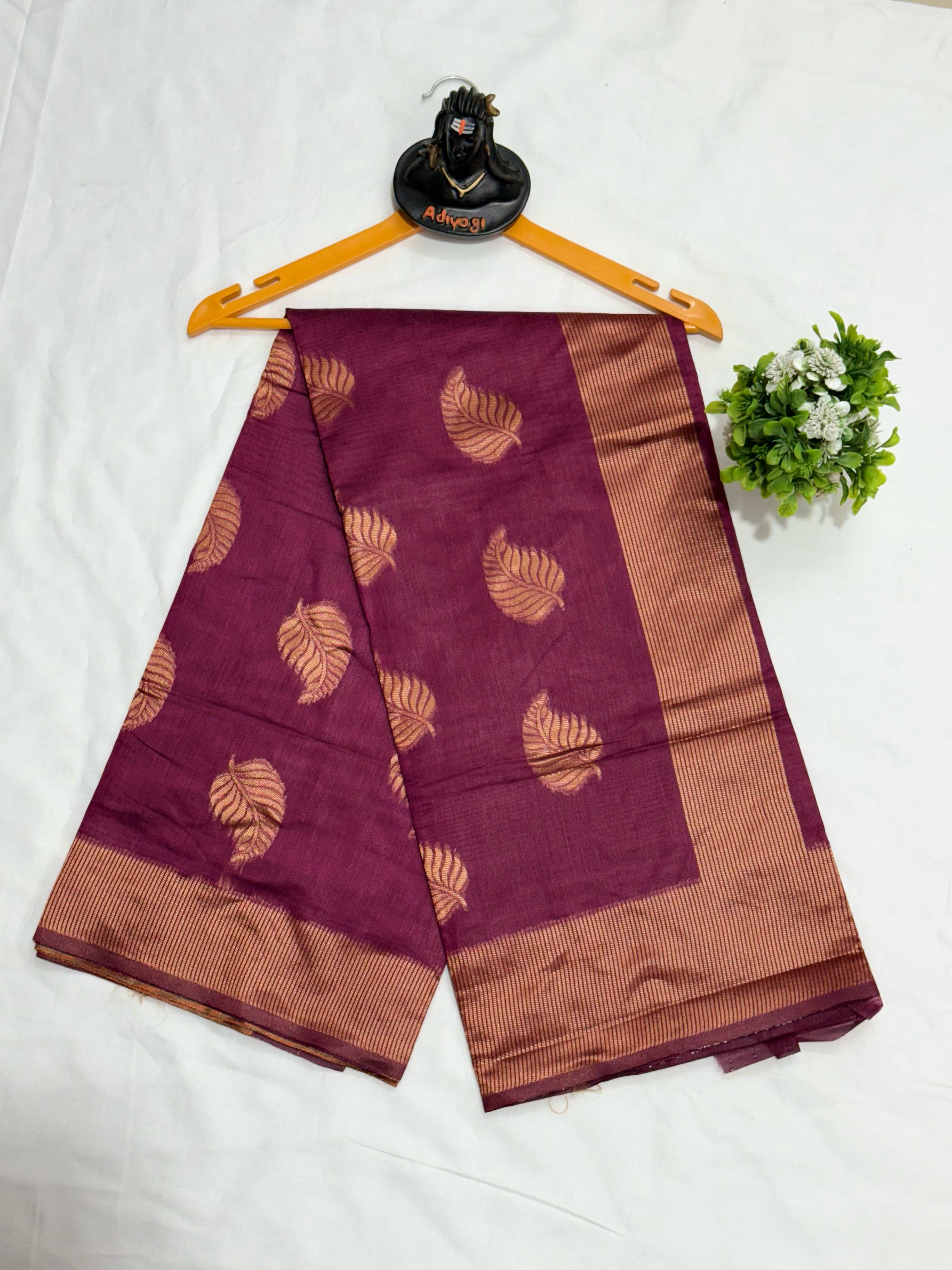Exquisite Banarsi soft silk saree with copper jari leaf weaving and jacquard blouse.