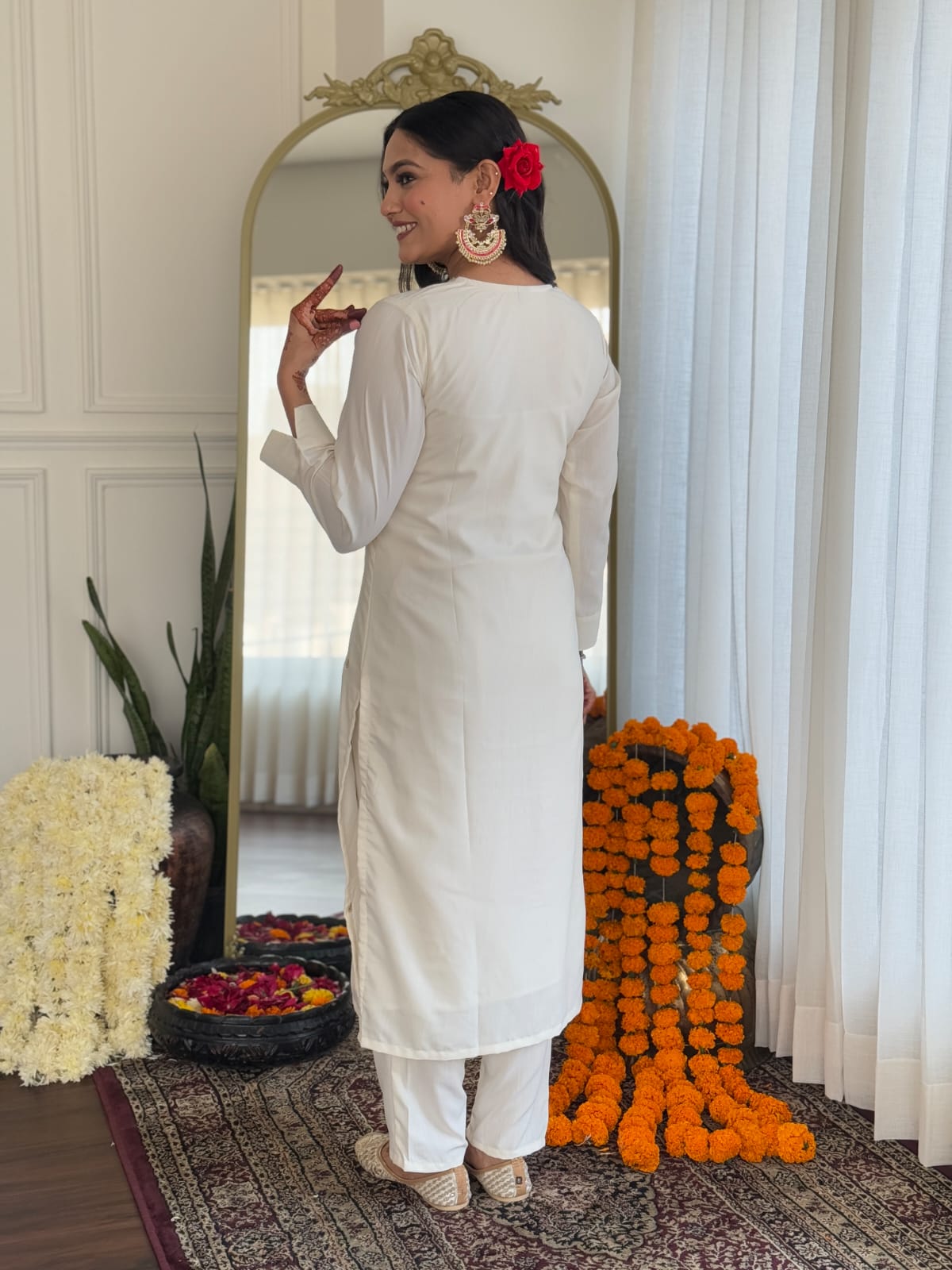 Back view of a TRENDBUY model wearing the elegant white rayon kurti set, showcasing the simple yet chic design and clean lines.