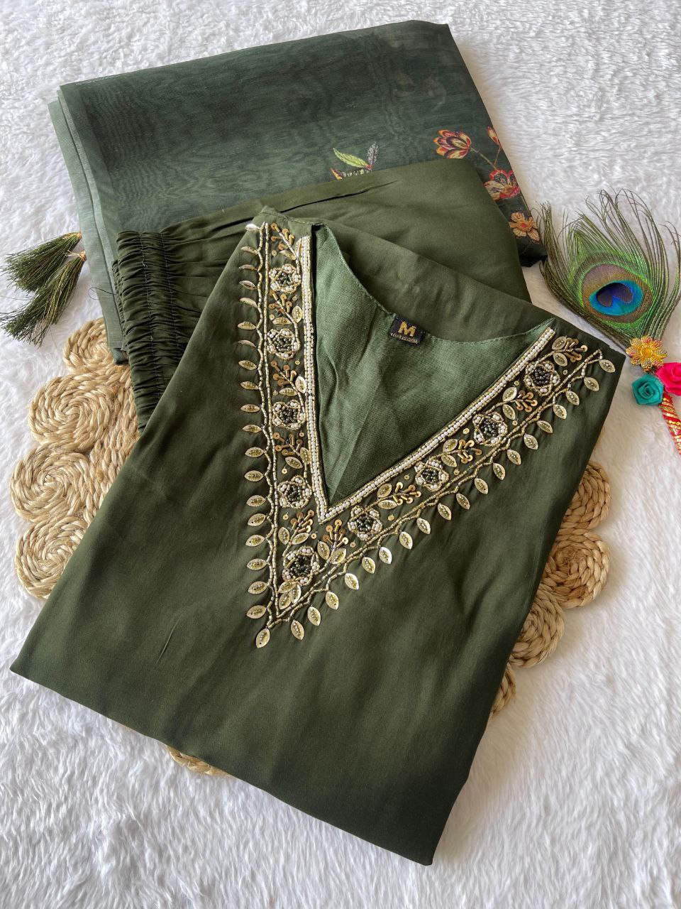 Model in Diwali special mehendi color kurti, pant, and dupatta set.