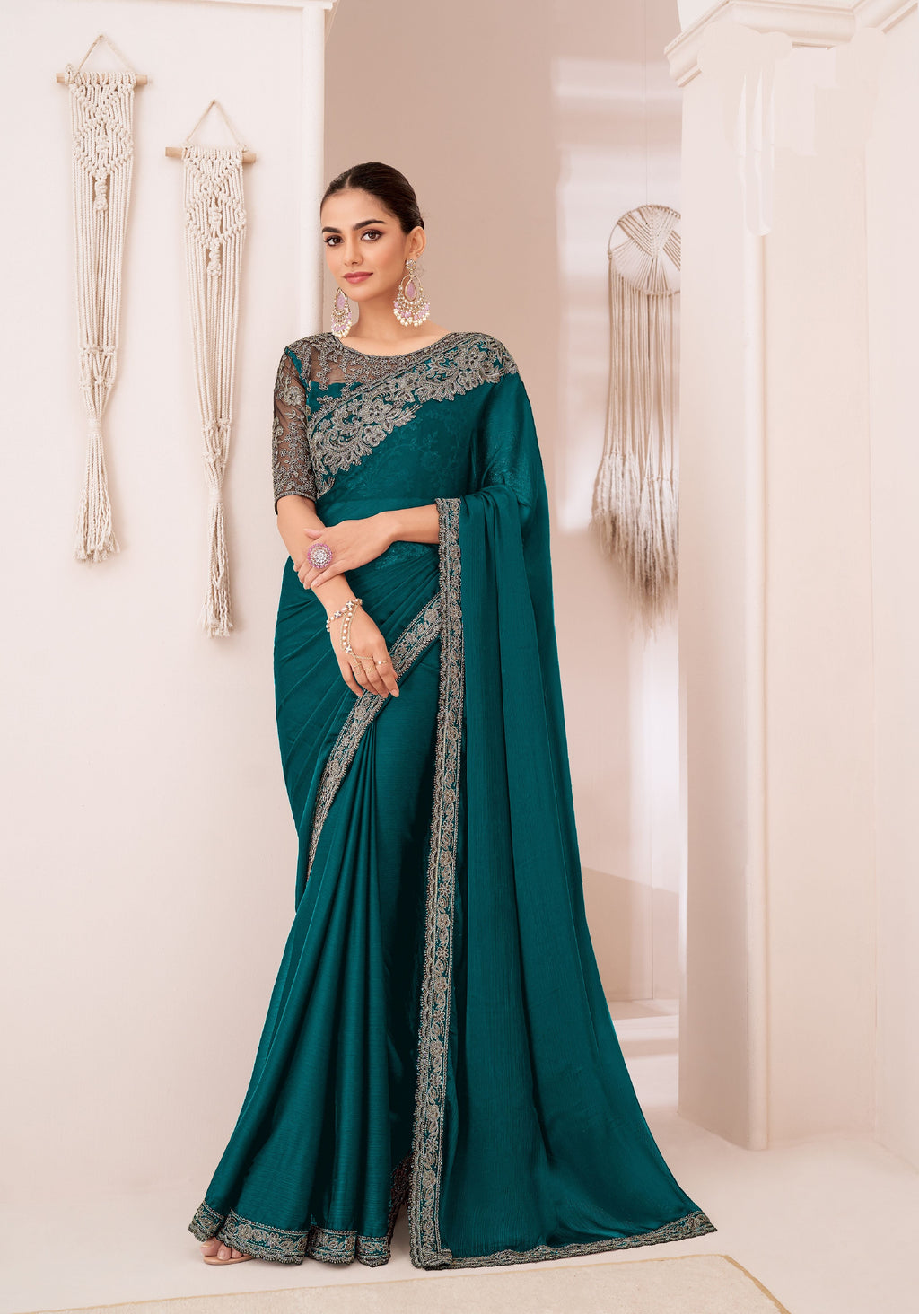 Forest green georgette chiffon silk saree, elegantly draped.