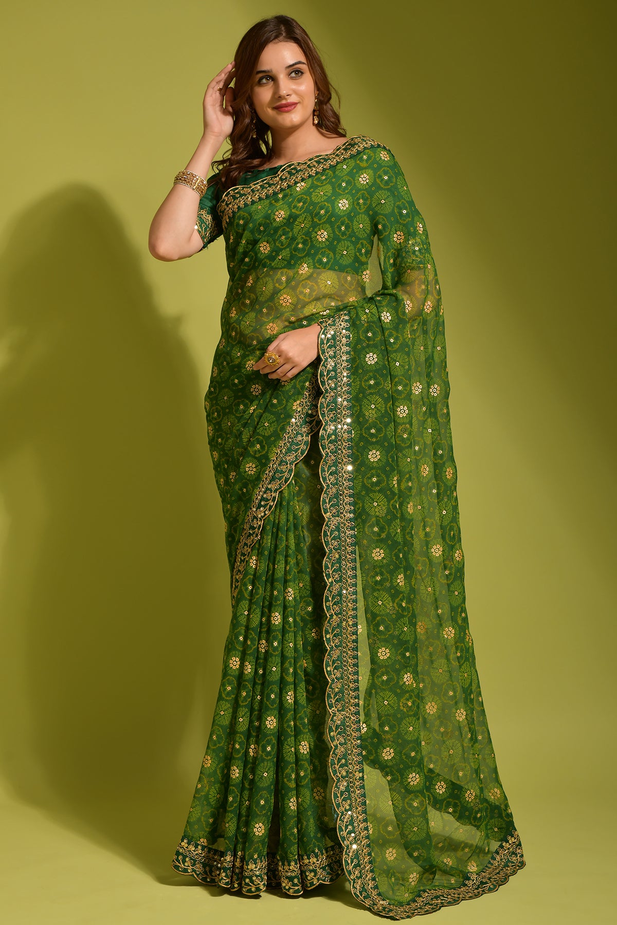 Exquisite green Georgette Chiffon Saree featuring flower print, foil, and sequin work.