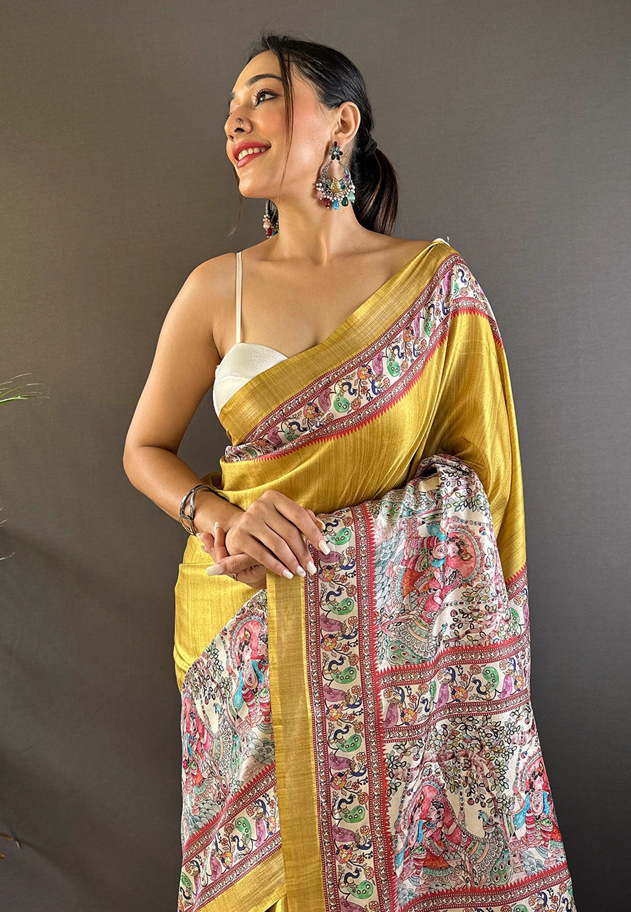 Close-up of the intricate digital Madhubani print patterns on the gold silk fabric