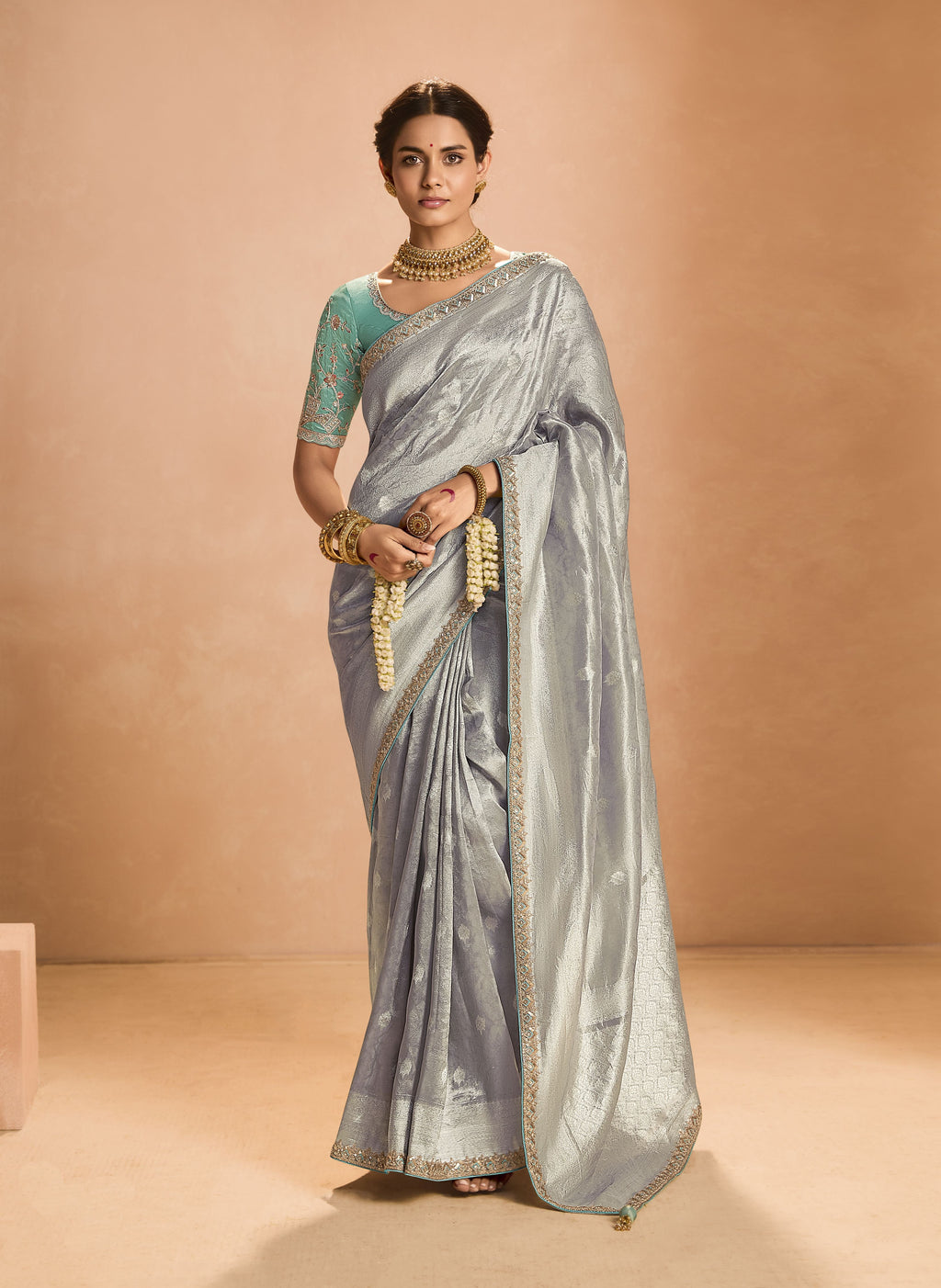 Stunning gray tissue silk party wear saree with intricate embellishments