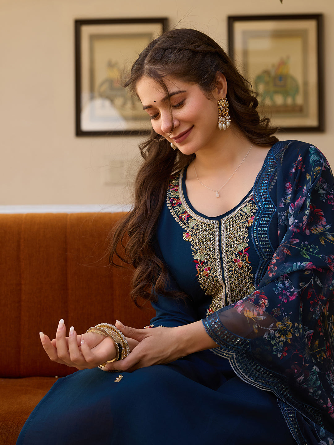 Close-up of model's face and hands, showcasing the intricate bead embroidery on the TRENDBUY HR-21 kurti neckline.