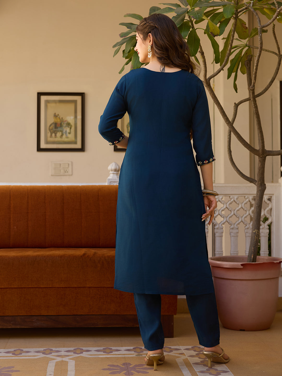 Back view of model standing, showing the simple elegance and sleeve details of the TRENDBUY HR-21 deep blue kurti set.
