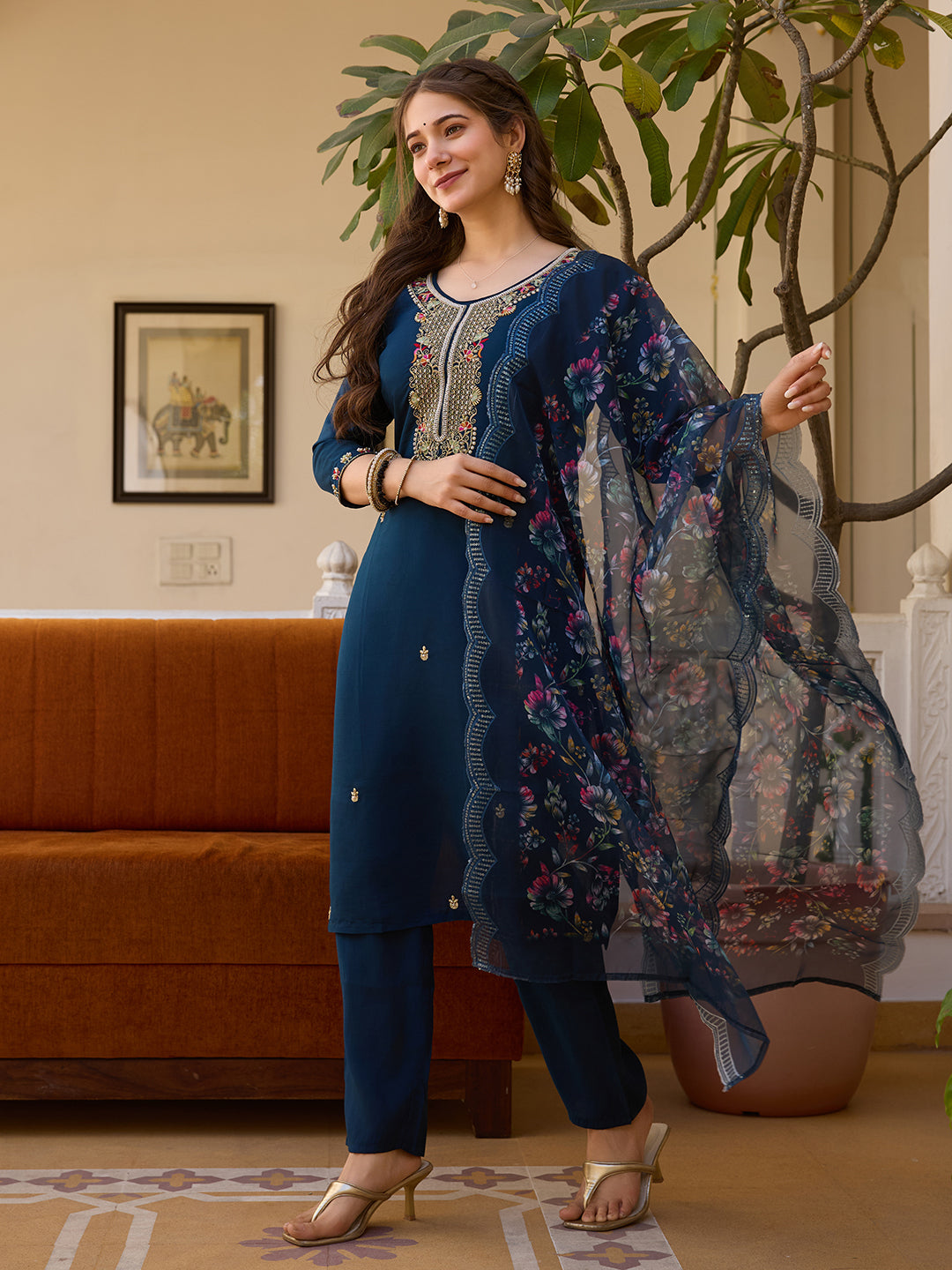 Model adjusting the lightweight floral Tabby Organza dupatta of the TRENDBUY HR-21 kurti set, showcasing its flow and print.