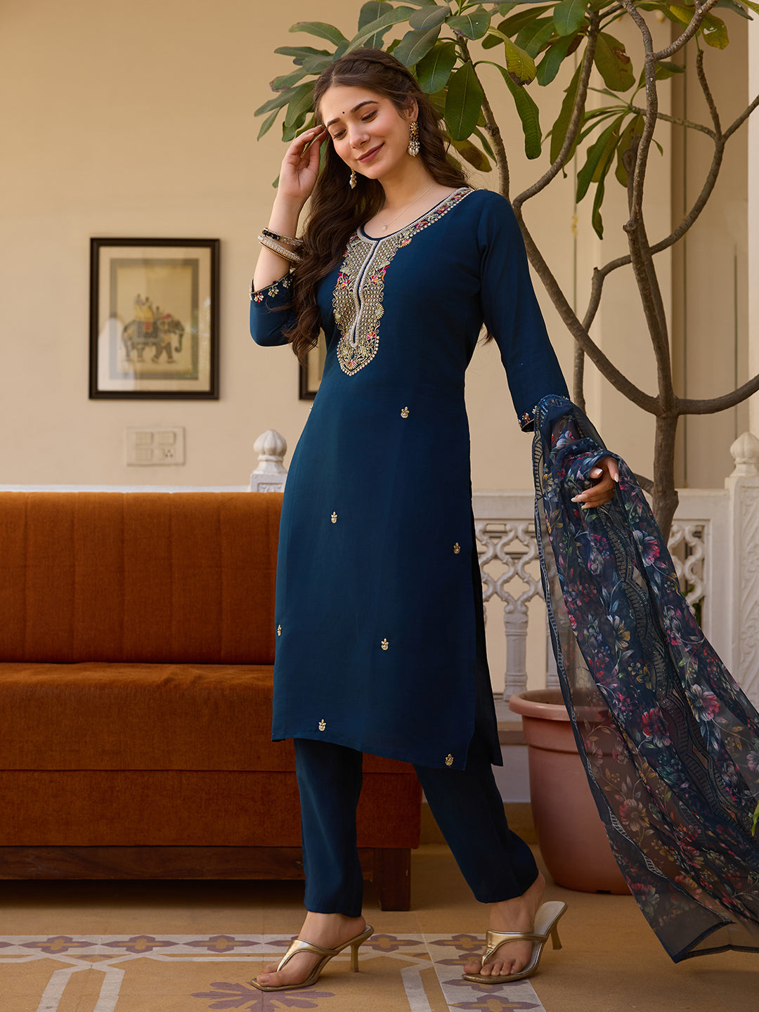 Side view of model with the TRENDBUY HR-21 deep blue kurti set, revealing the full sleeves and delicate kurti embroidery.