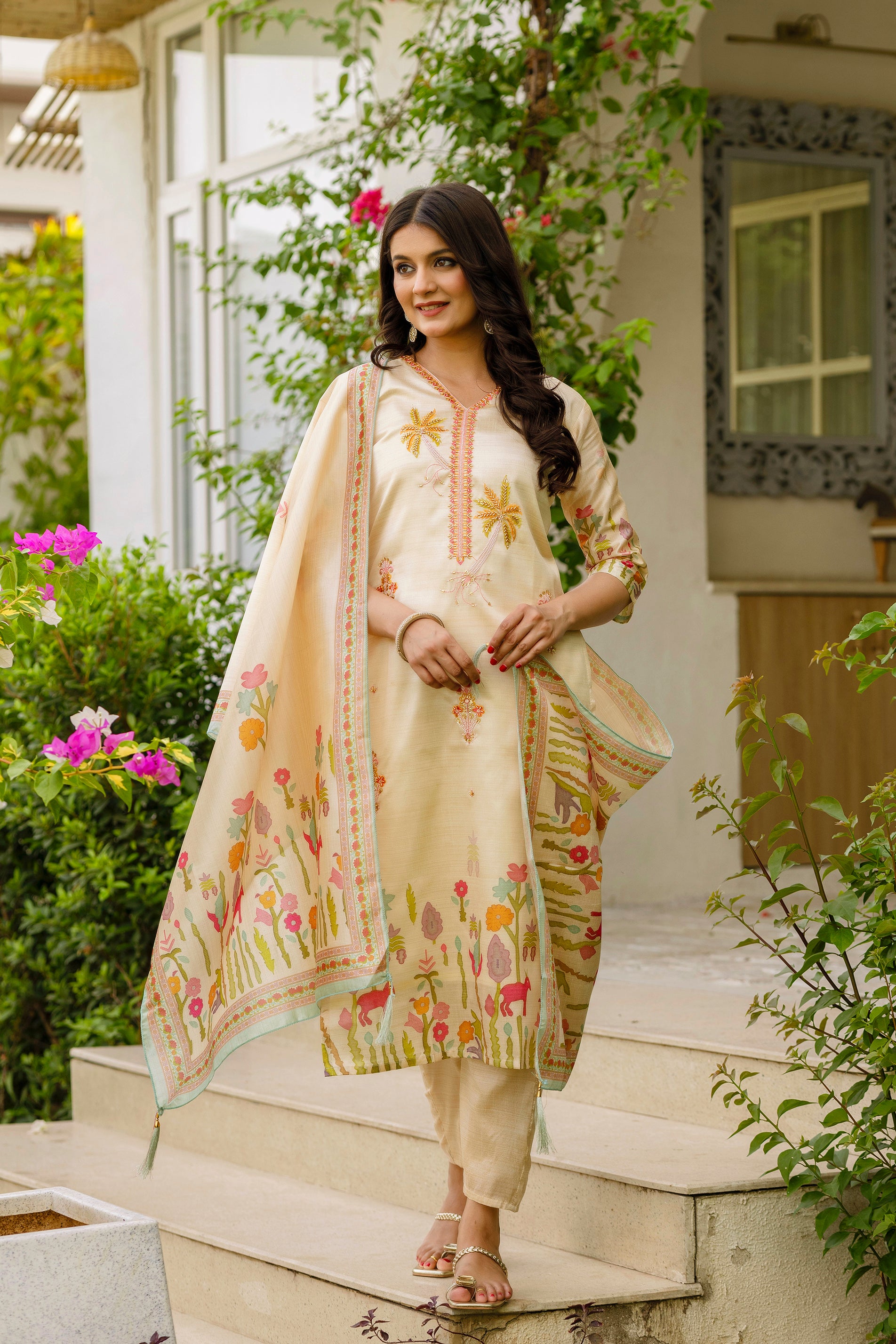Model standing confidently in the TRENDBUY HR-24 embroidered kurti, pant, and dupatta set, vibrant outdoor setting.