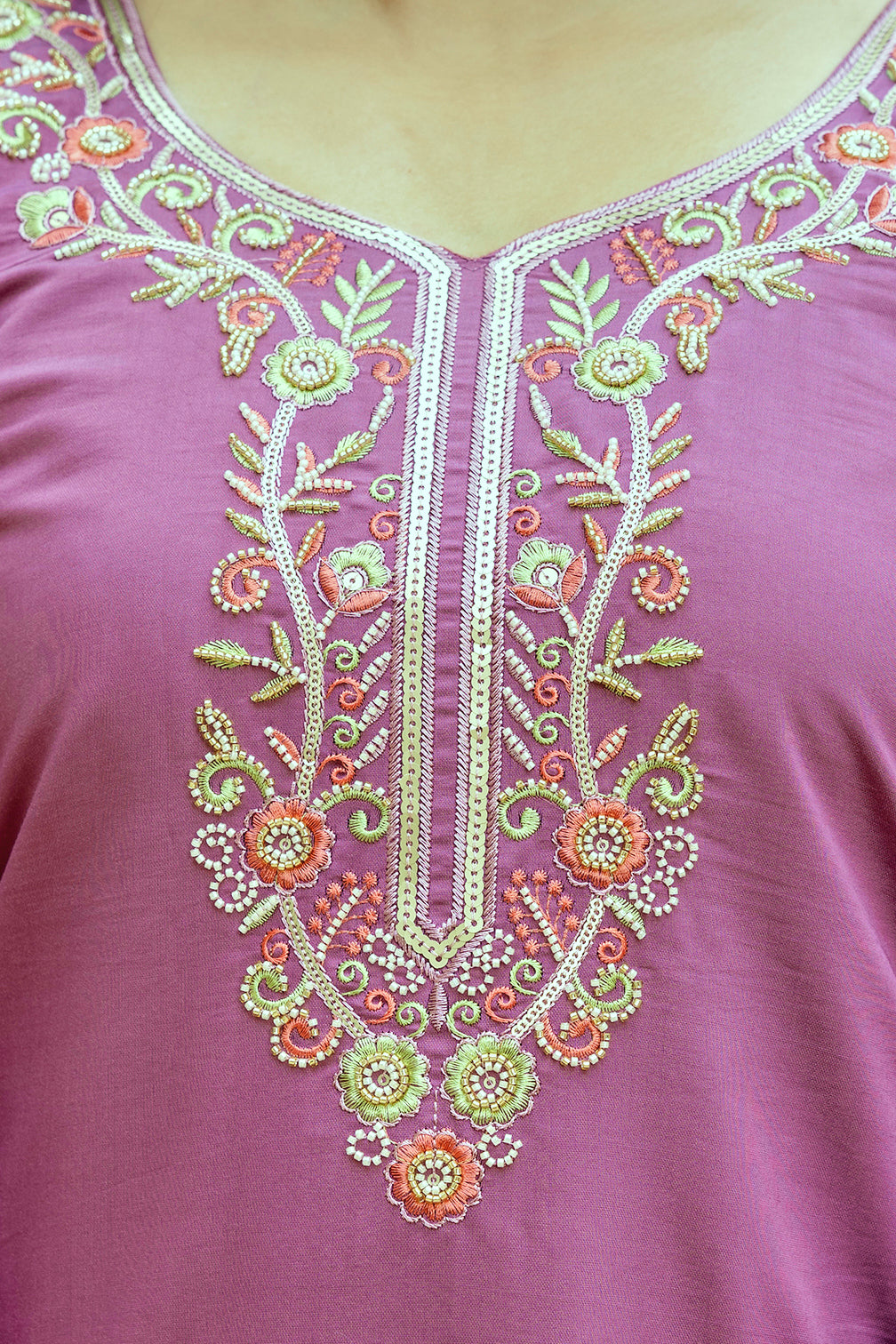 Detailed view of the vibrant and intricate floral embroidery and beadwork design on the neckline of the TRENDBUY violet Viscose Chanderi silk kurti