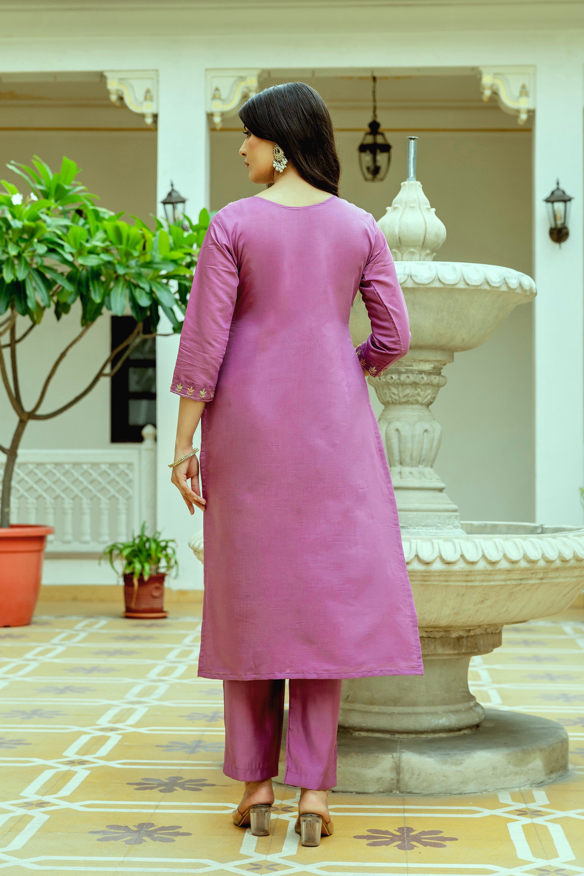 Back view of the TRENDBUY violet Viscose Chanderi silk kurti and pant set, showing the clean finish and subtle embroidered details on the sleeves and hem