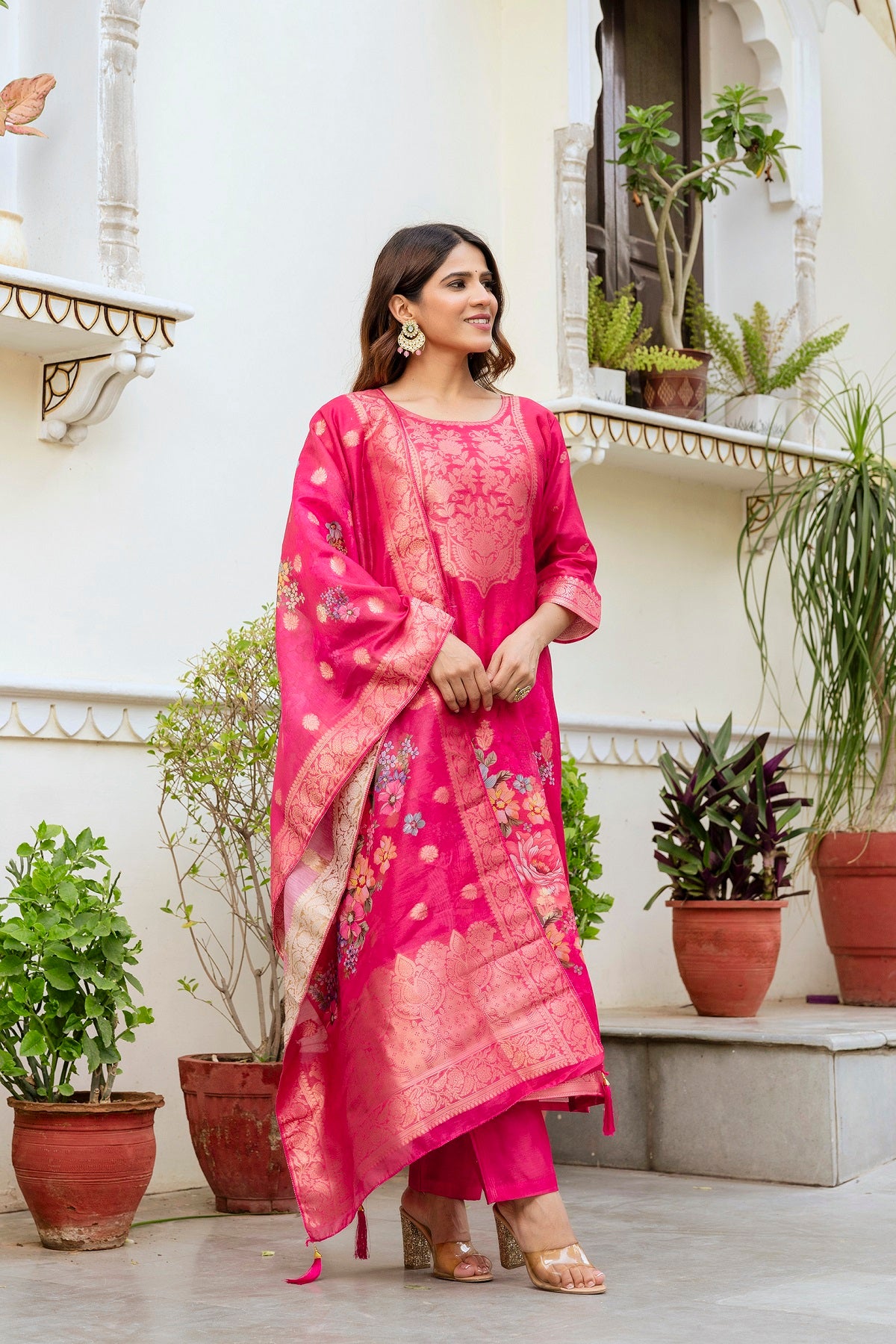 Model showcasing the beautiful floral printed dupatta of the pink kurti set.