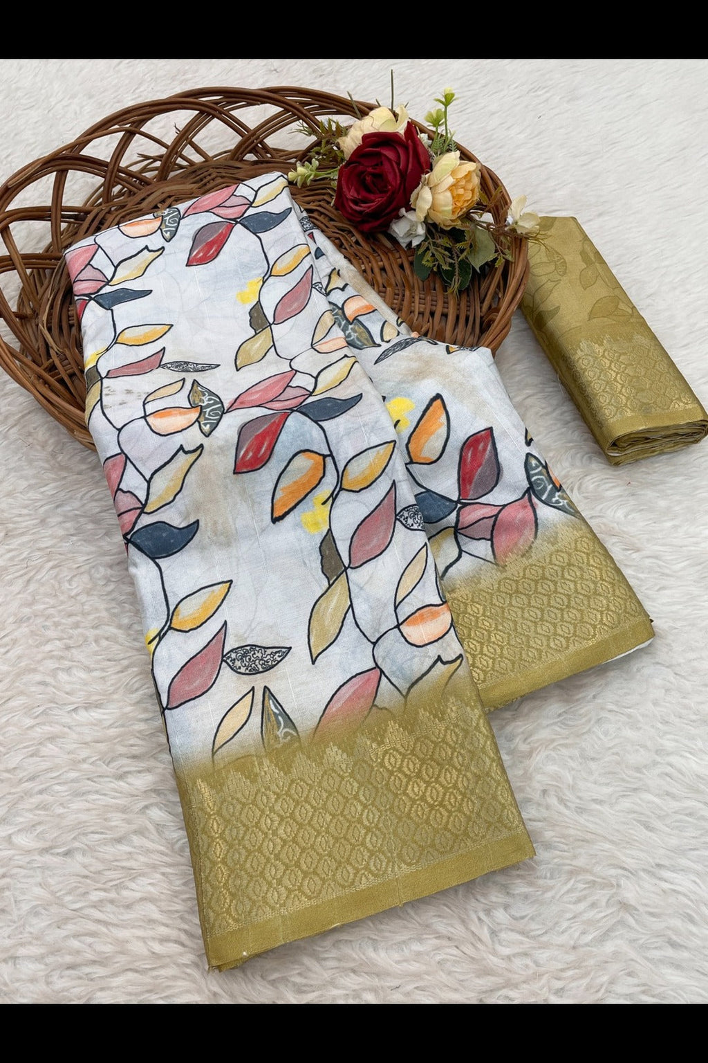 Close-up of intricate gold Banarasi motifs on olive green silk fabric